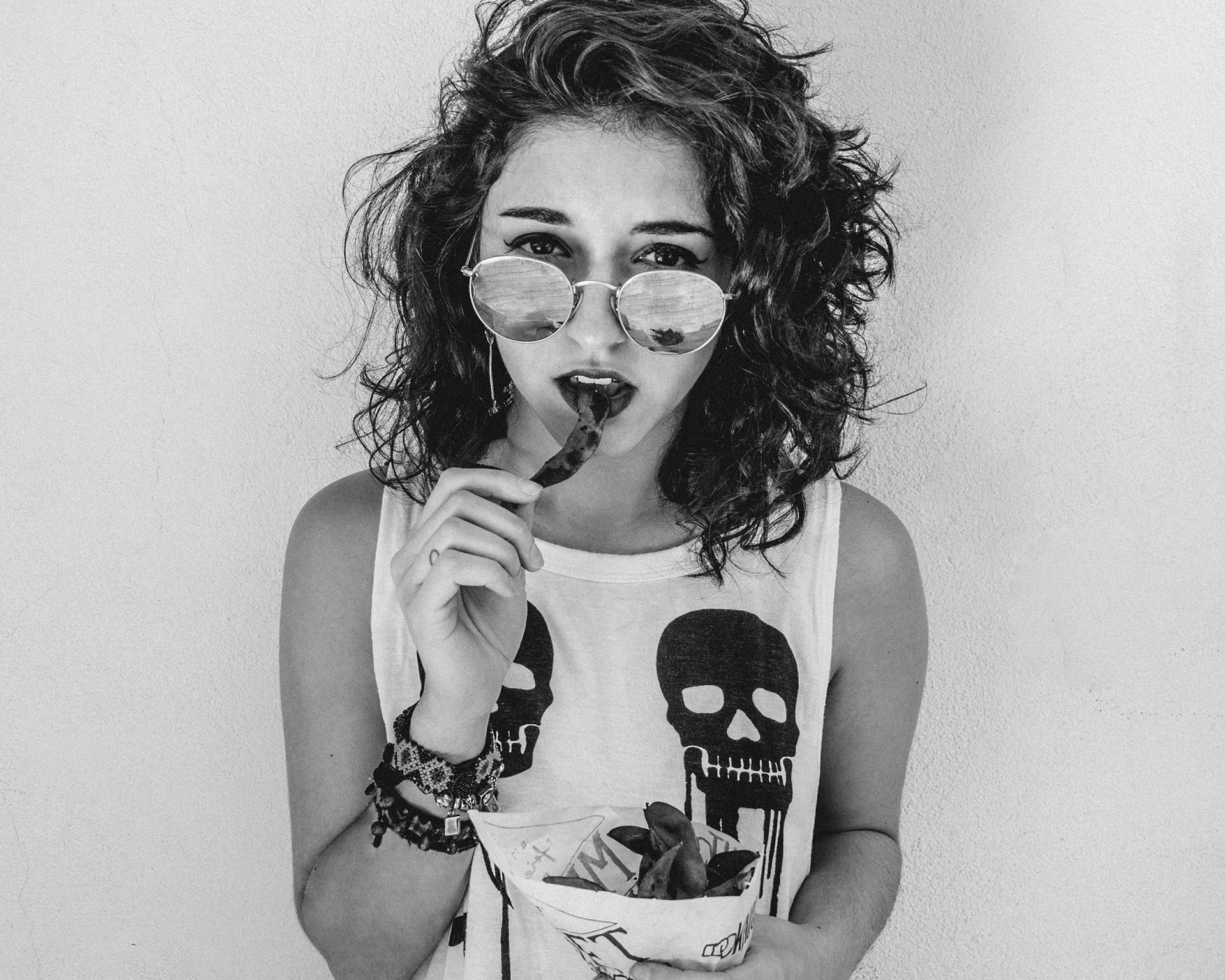 People 1920x1536 women model brunette monochrome glasses women with glasses tank top white tops white clothing skull eating bracelets simple background looking at viewer lipstick earring bare shoulders shoulder length hair reflection