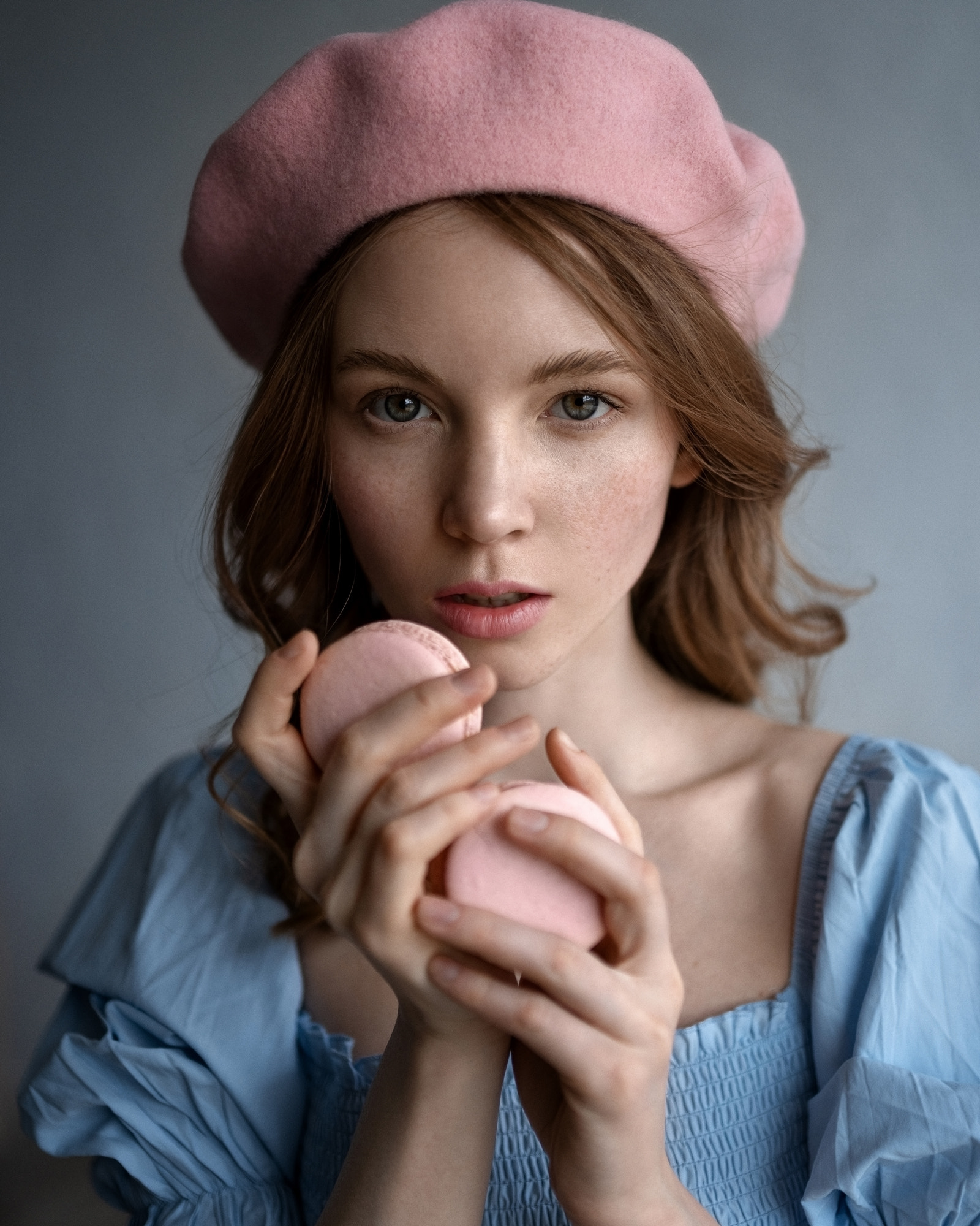 People 1600x2000 Aleksandr Kurennoi women hat pink brunette freckles blue clothing food portrait macarons simple background