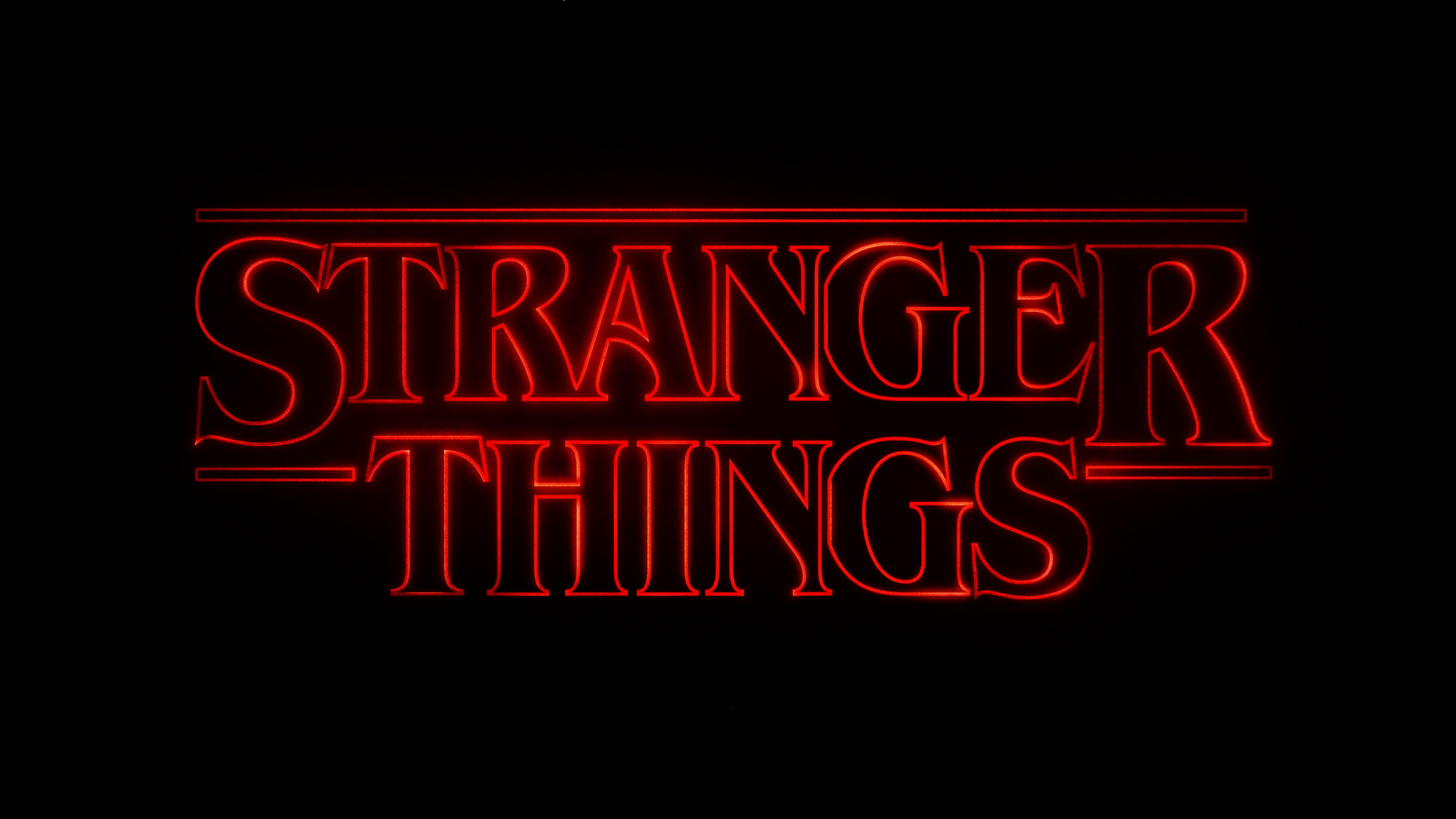 General 2560x1440 Stranger Things logo Netflix minimalism typography black background glowing TV series digital art simple background