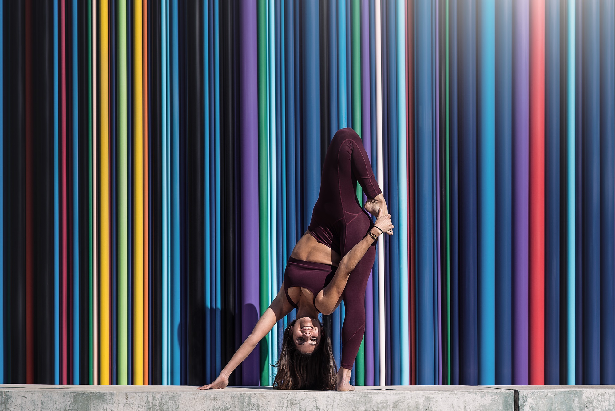 People 2000x1335 flexible colorful headstand women sport yoga pants sports bra