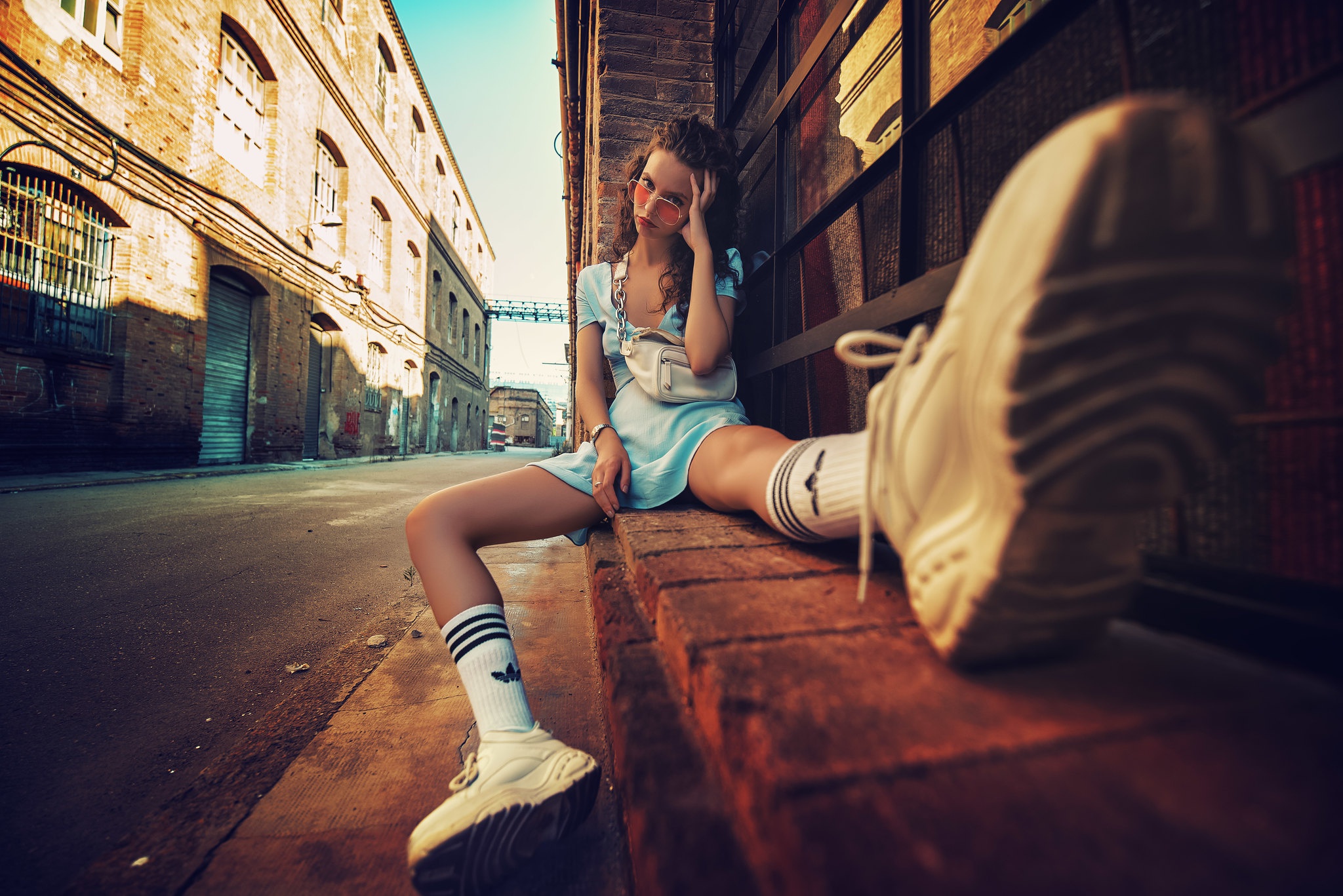 People 2048x1367 Alex Siracusano model women brunette mouth lips lipstick shirt shorts legs socks sneakers urban street building city sunglasses women with shades touching face looking at viewer portrait white socks striped socks crew socks blue dress spread legs white shoes pointed toes alleyway