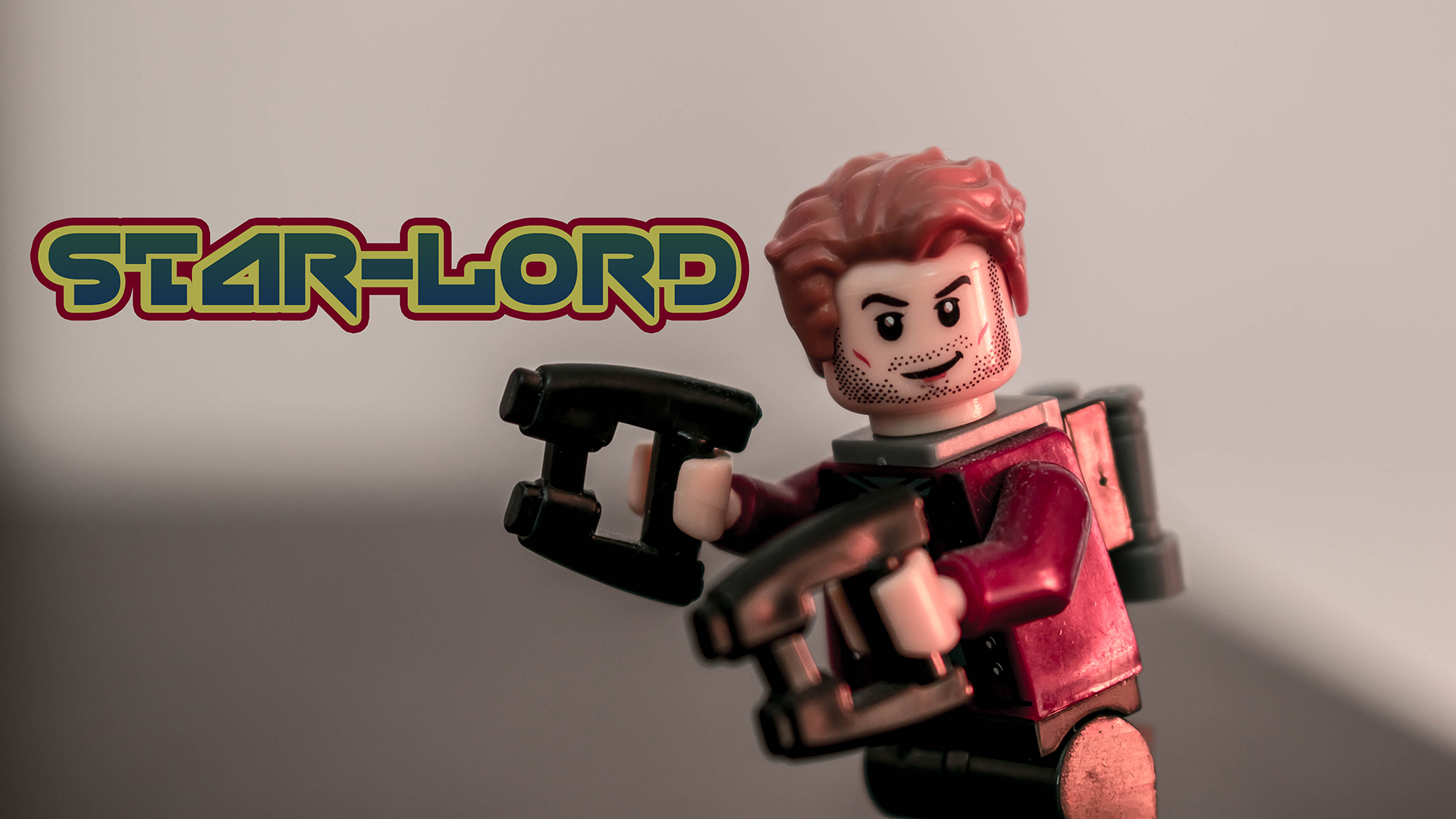 General 1920x1080 Guardians of the Galaxy Guardians of the Galaxy Vol. 2 LEGO pistol blurred simple background gray background retro style Marvel Comics Marvel Cinematic Universe Marvel Heroes Marvel Super Heroes Star-Lord figurines toys