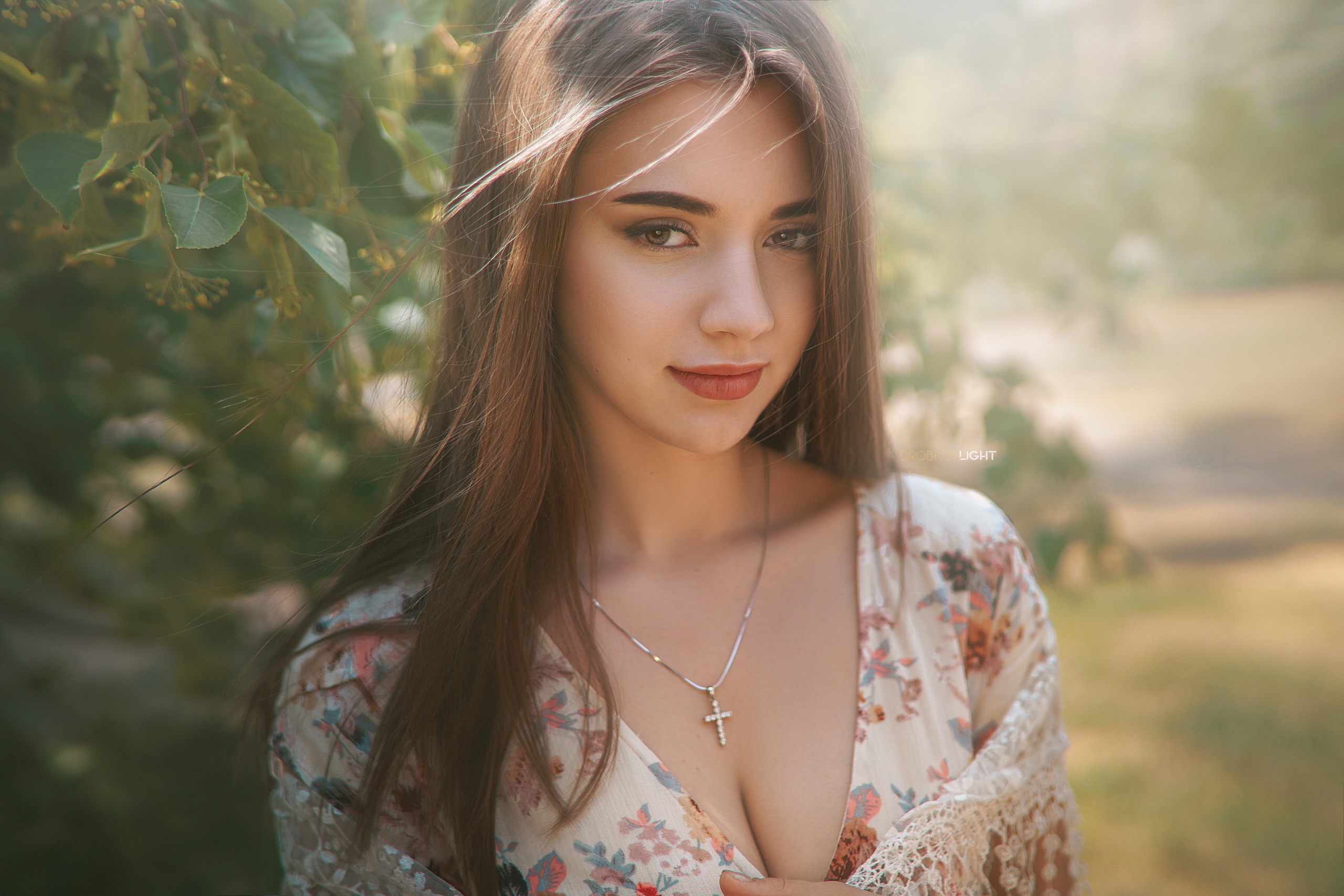 People 2560x1707 women model brunette looking at viewer red lipstick long hair smiling face portrait outdoors depth of field necklace cleavage dress women outdoors Alexander Drobkov summer  dress cross Veronika Bakutina closed mouth crucifix necklace Caucasian makeup brown eyes