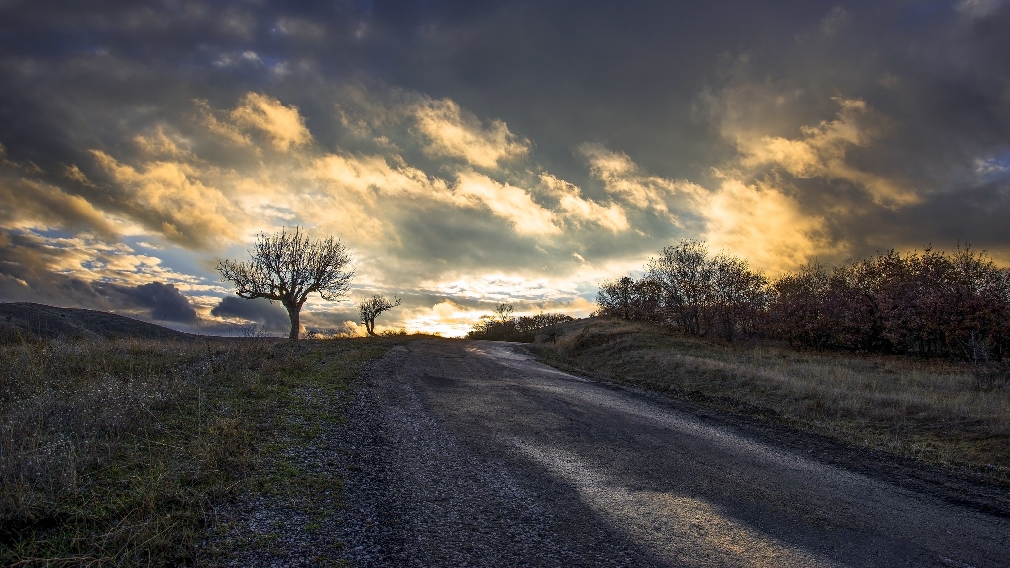 General 2048x1152 clouds road trees landscape dirt road outdoors sky