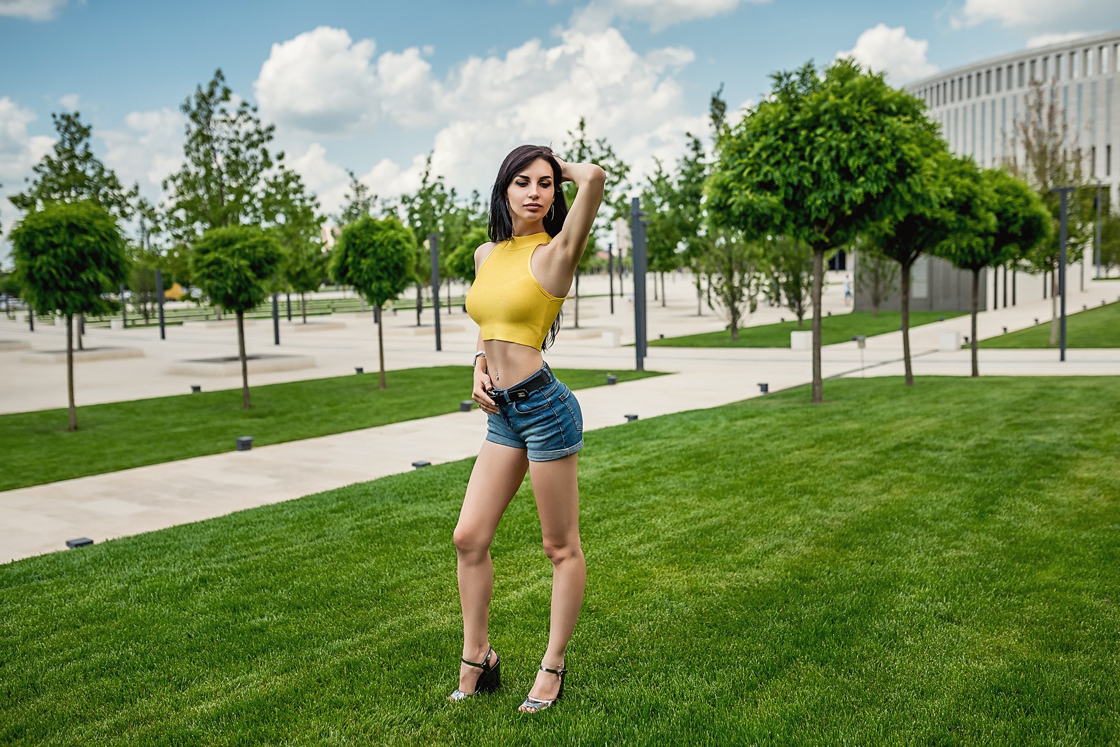People 2200x1468 women Lioka Grechanova trees brunette jean shorts belly women outdoors grass portrait armpits pierced navel belt