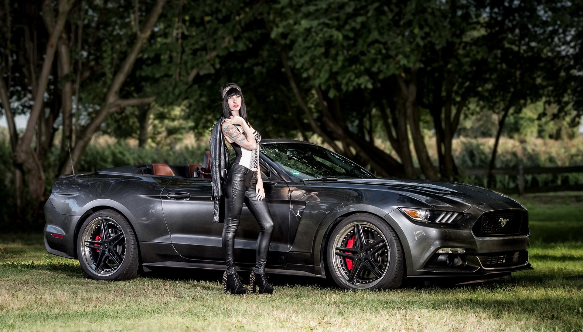 People 1920x1095 women punk women with cars car vehicle model black cars tattoo women outdoors Ford Mustang Ford leather pants  heels standing black hair Ford Mustang S550 muscle cars American cars
