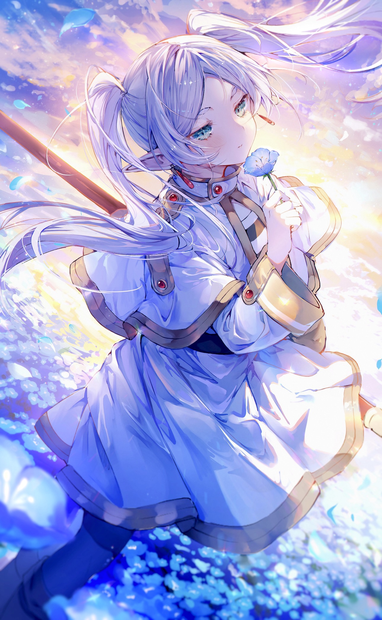 Anime 1288x2089 Sousou No Frieren elves portrait display anime girls Frieren looking at viewer green eyes blue flowers pointy ears white hair Noyu women outdoors closed mouth twintails petals staff sky looking back long hair long sleeves standing clouds field wind