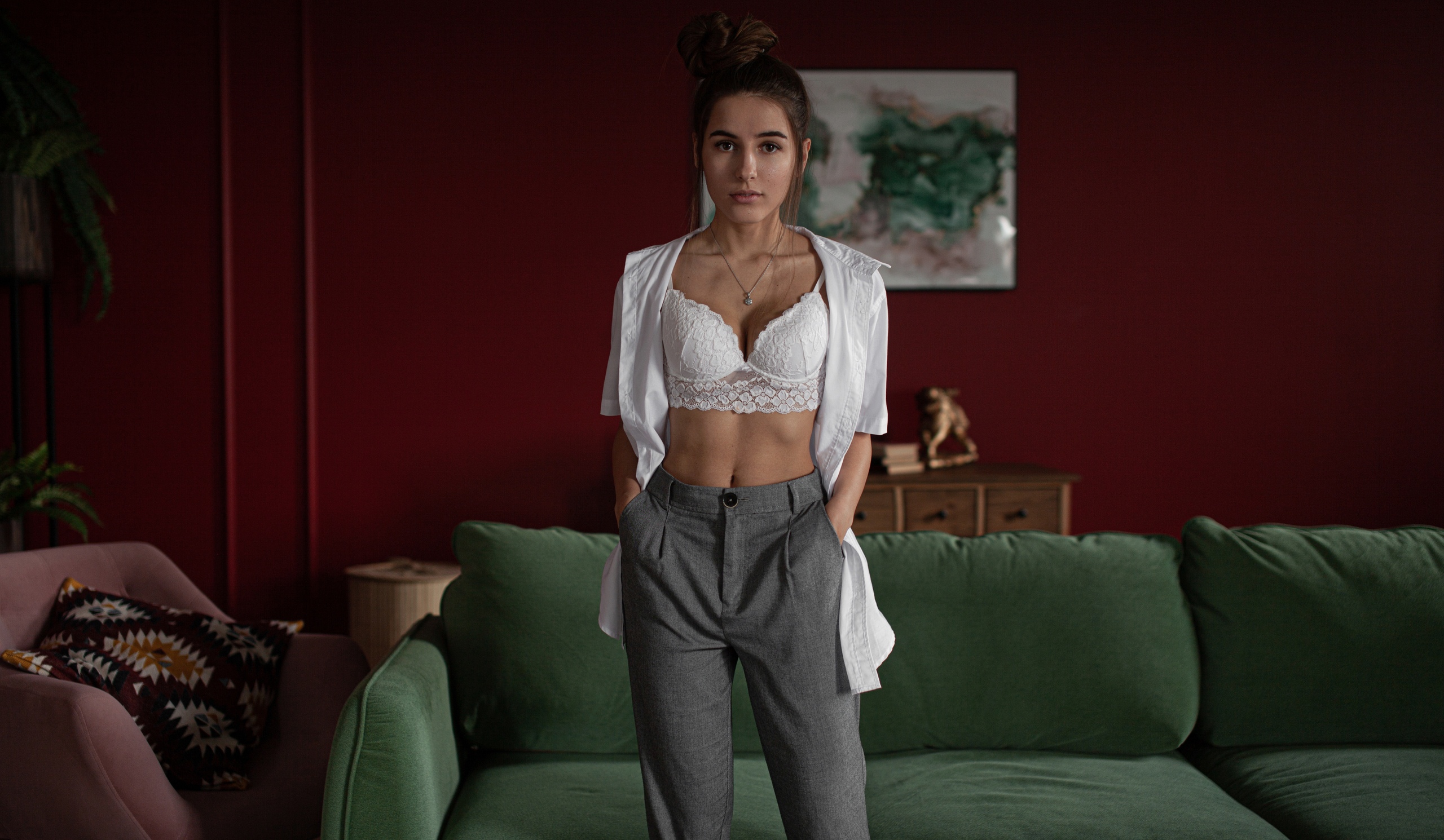 People 2560x1490 women model brunette hairbun brown eyes looking at viewer lingerie bra white bra underwear necklace belly pants shirt open shirt open clothes couch indoors skinny