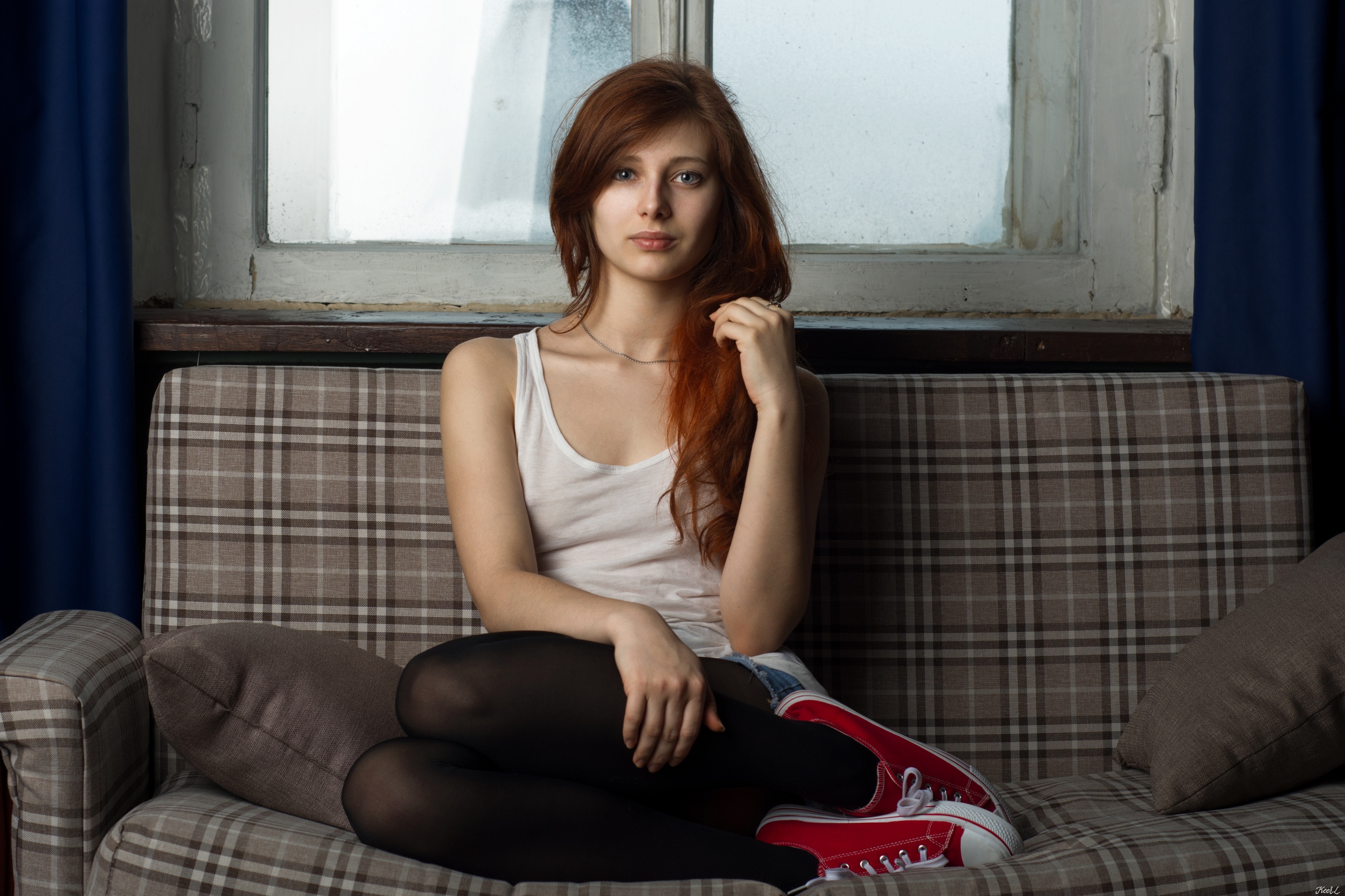 People 2560x1706 redhead long hair women model touching hair portrait frontal view white tops tank top jean shorts pantyhose Converse sitting necklace couch window indoors women indoors no bra Russian model collarbone