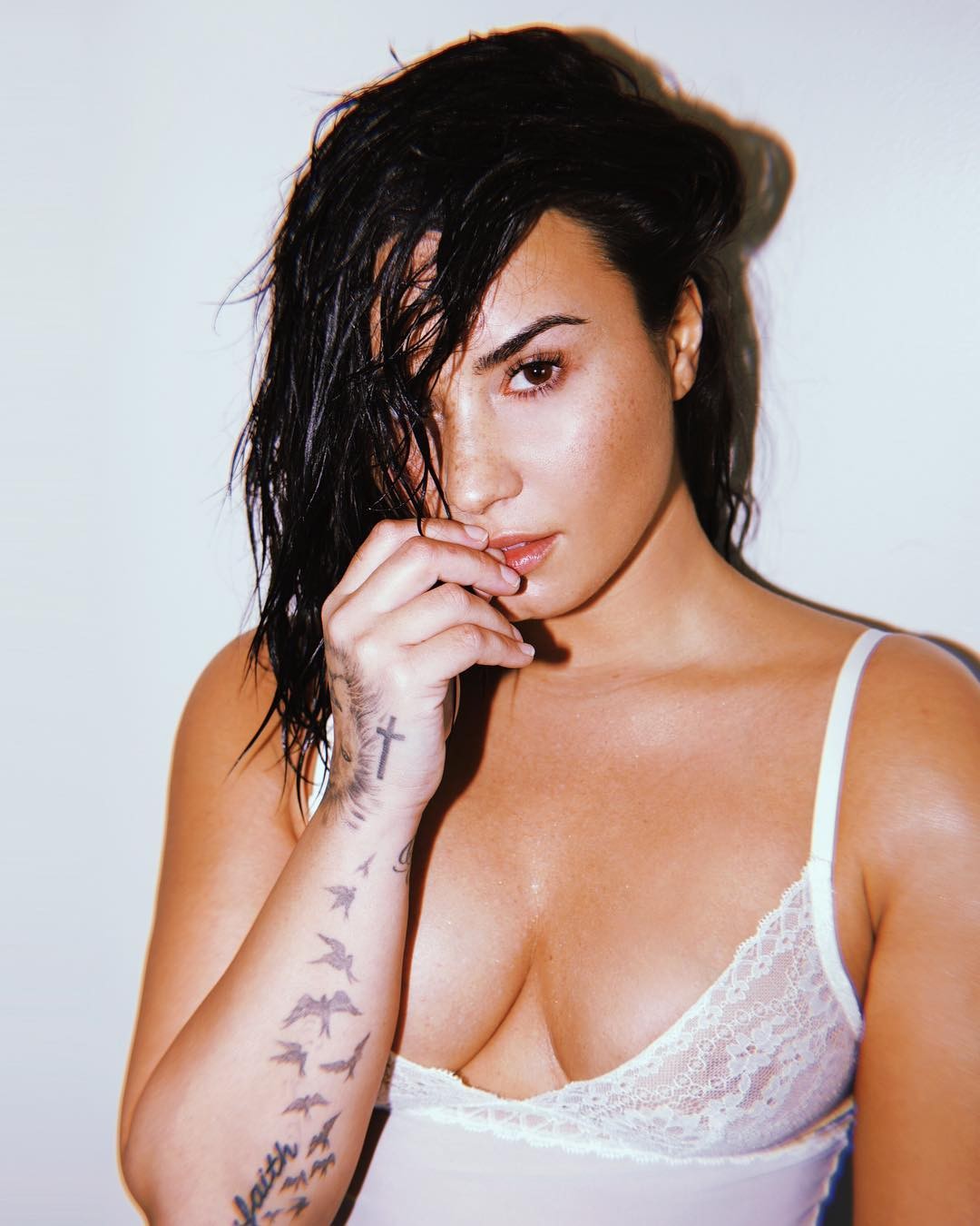 People 1080x1350 Demi Lovato tattoo black hair women cleavage