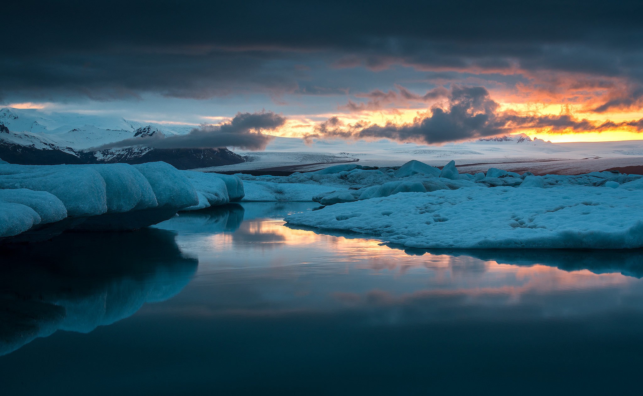 General 2048x1260 nature landscape winter snow ice Iceland sunset lake mountains reflection calm waters water blue low light