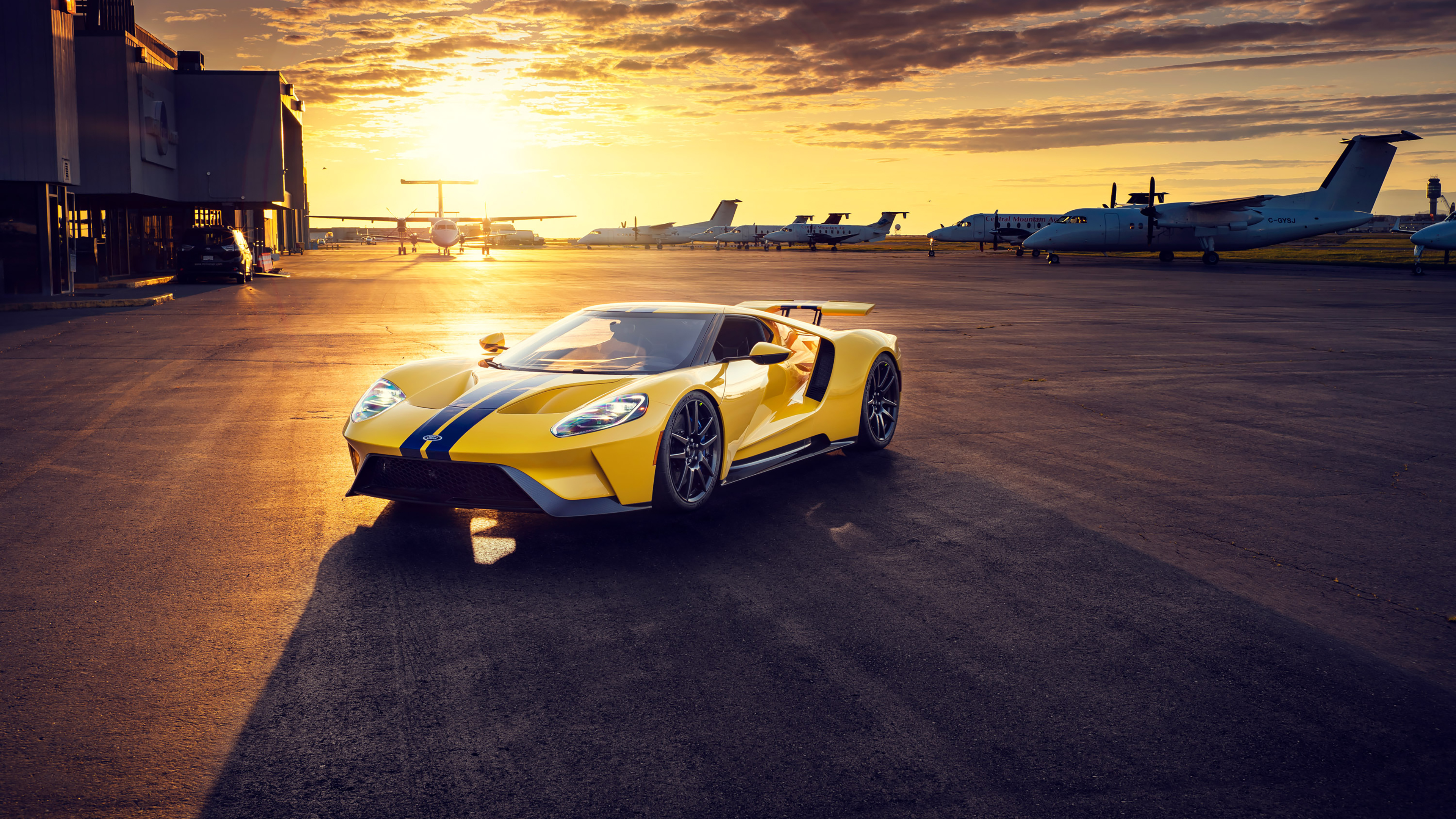 General 3840x2160 Ford GT car vehicle airport sunset aircraft yellow cars sunlight Ford GT Mk II supercars runway Ford American cars