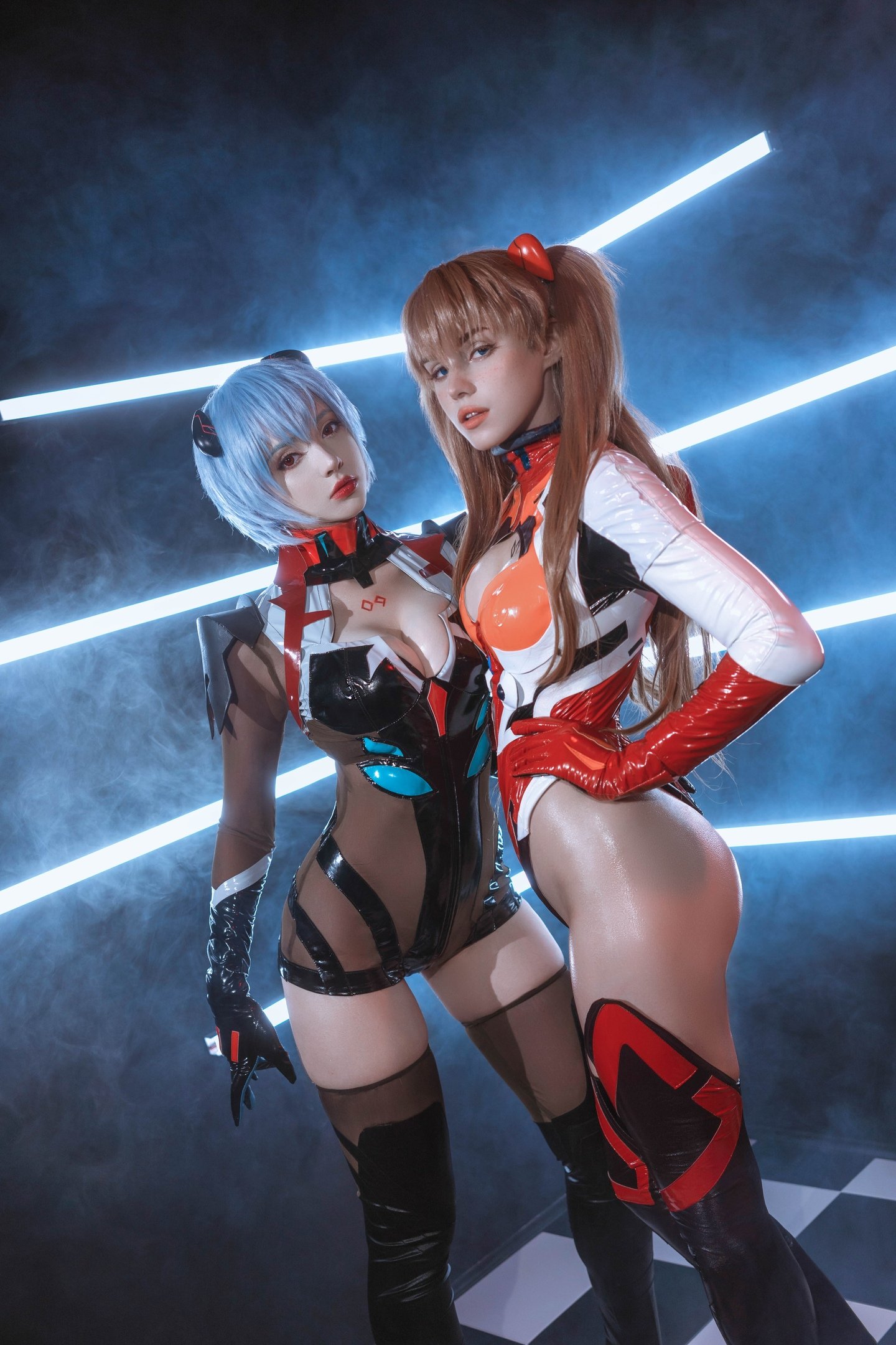 People 1440x2160 women model cosplay Asuka Langley Soryu Ayanami Rei Neon Genesis Evangelion redhead two women short hair blue hair twintails looking at viewer bodysuit latex ass thigh-highs parted lips indoors women indoors legs thighs Shirogane Sama Sai Westwood Russian women wide hips