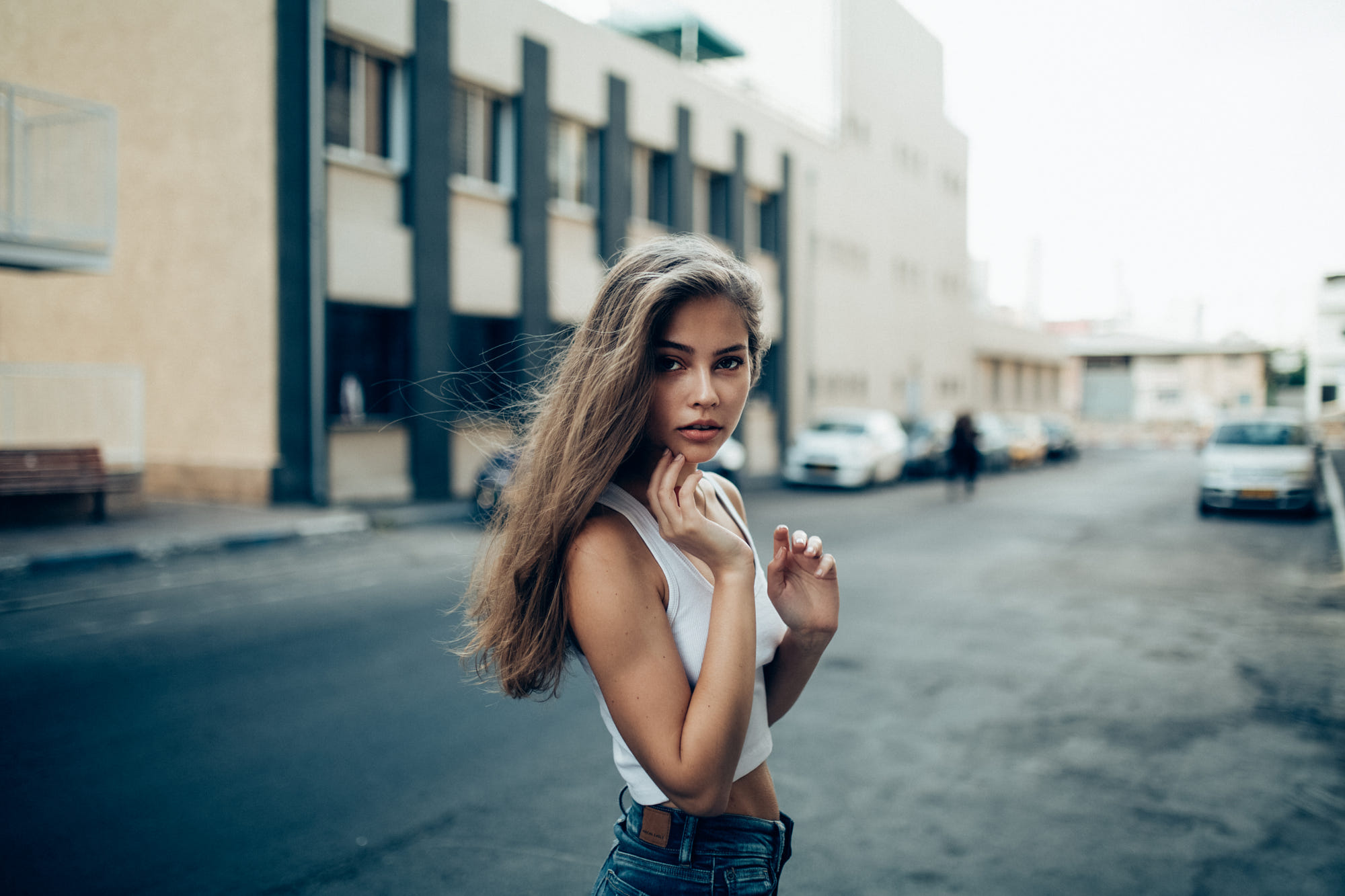 People 2000x1333 women model brunette brown eyes open mouth white tops tank top denim jeans looking at viewer depth of field