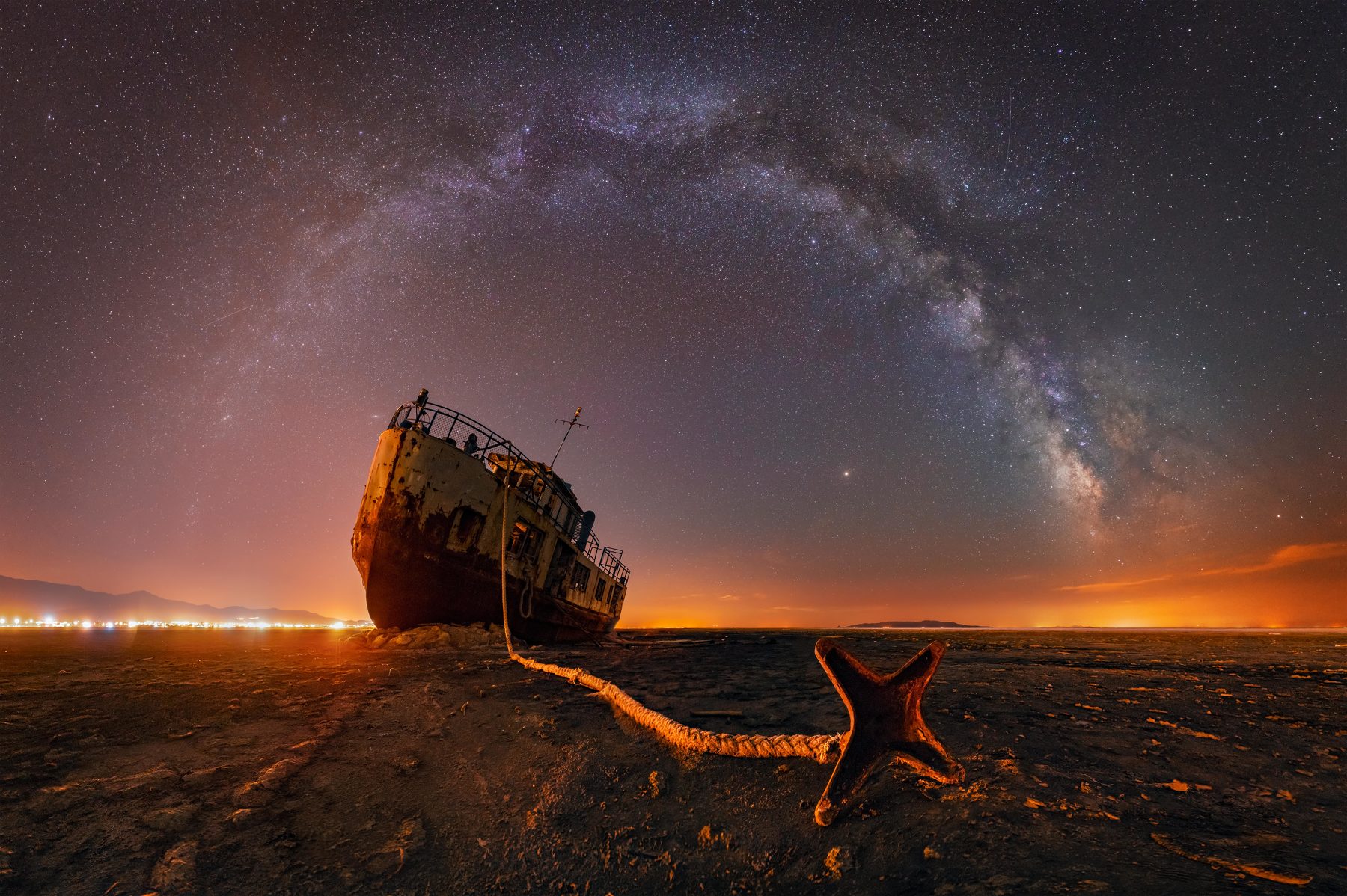 General 1800x1198 landscape photography long exposure Milky Way space sky stars nature boat horizon lights night anchors city lights starred sky shipwreck