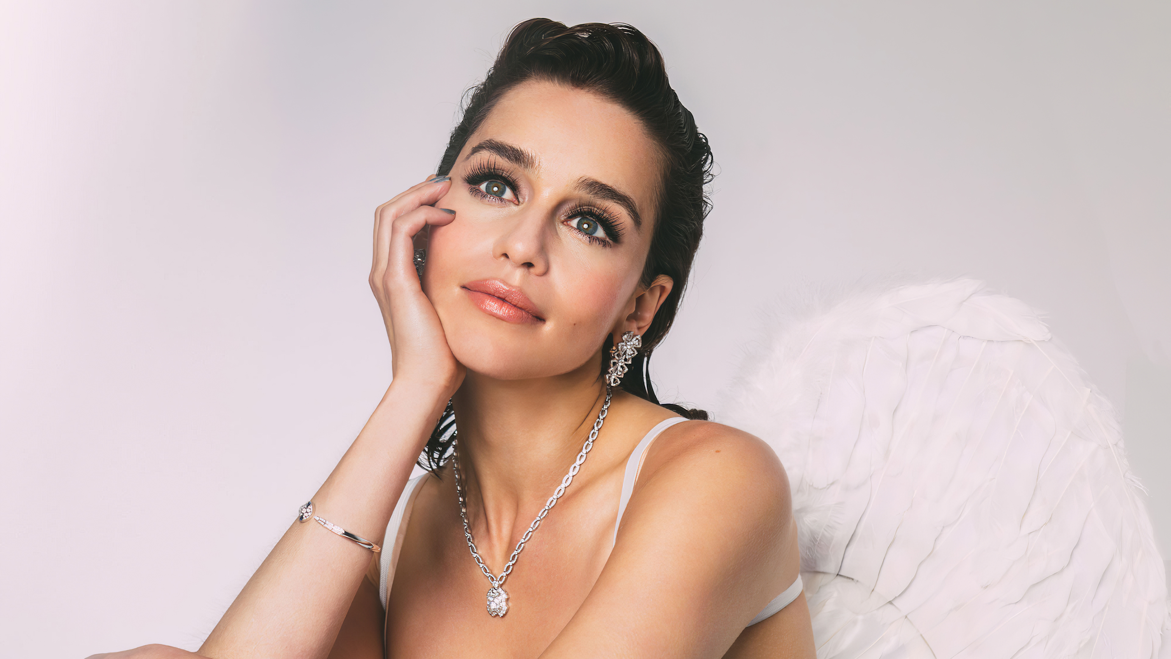 People 3840x2160 Emilia Clarke celebrity actress brunette glamour necklace women angel wings bracelets looking up simple background closeup