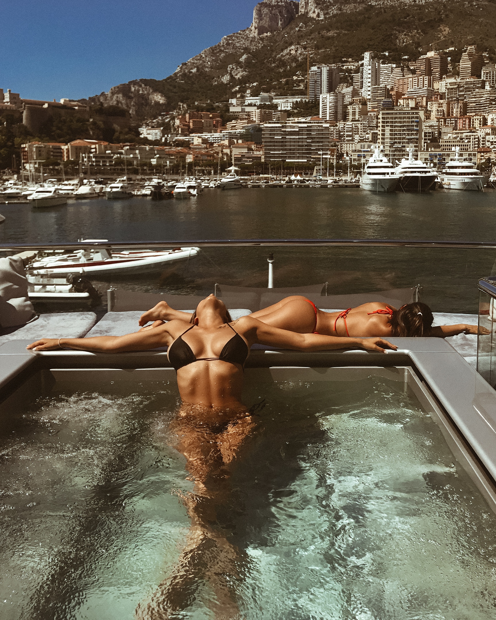 People 1728x2160 Vladimir Shalyapin women two women Viki Odintcova Irina Dreyt brunette swimwear bikini sun bathing swimming pool pier dock relaxing Monaco