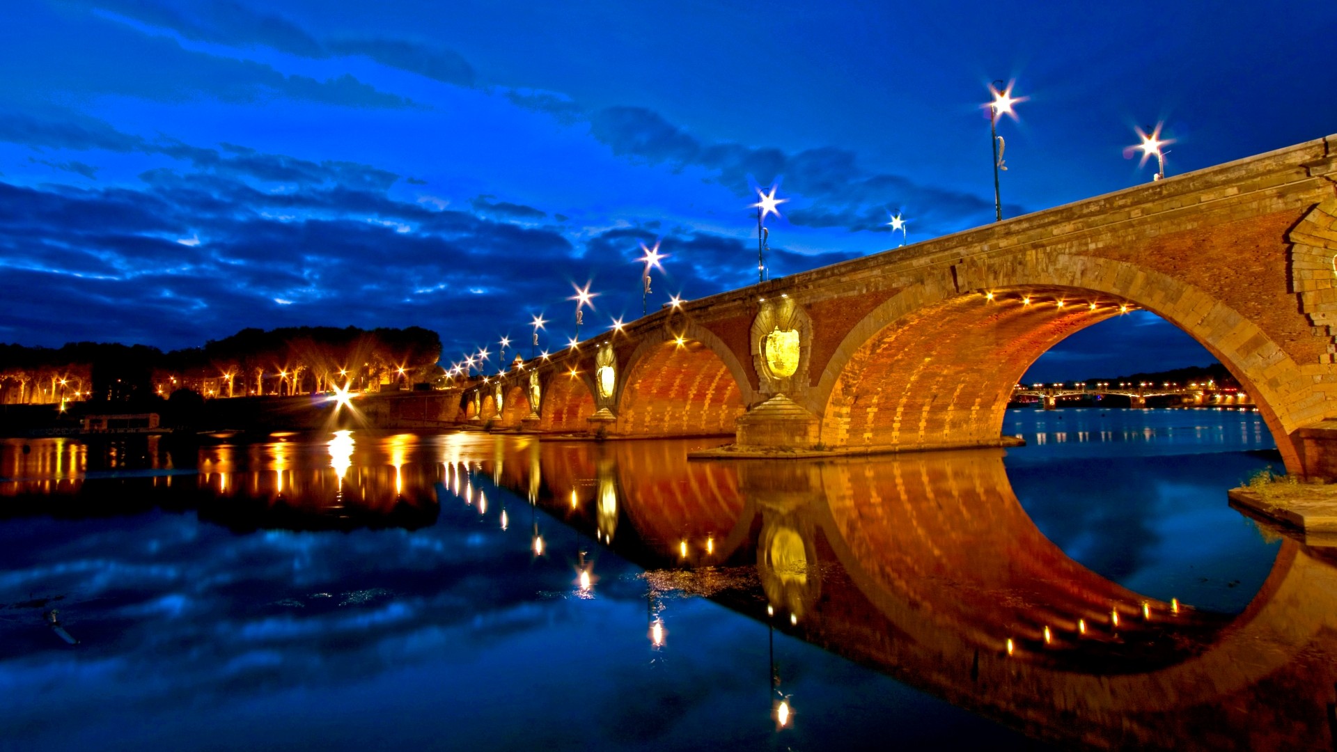 General 1920x1080 Toulouse Pont-Neuf Garonne France orange blue night city lights bridge arch calm waters river