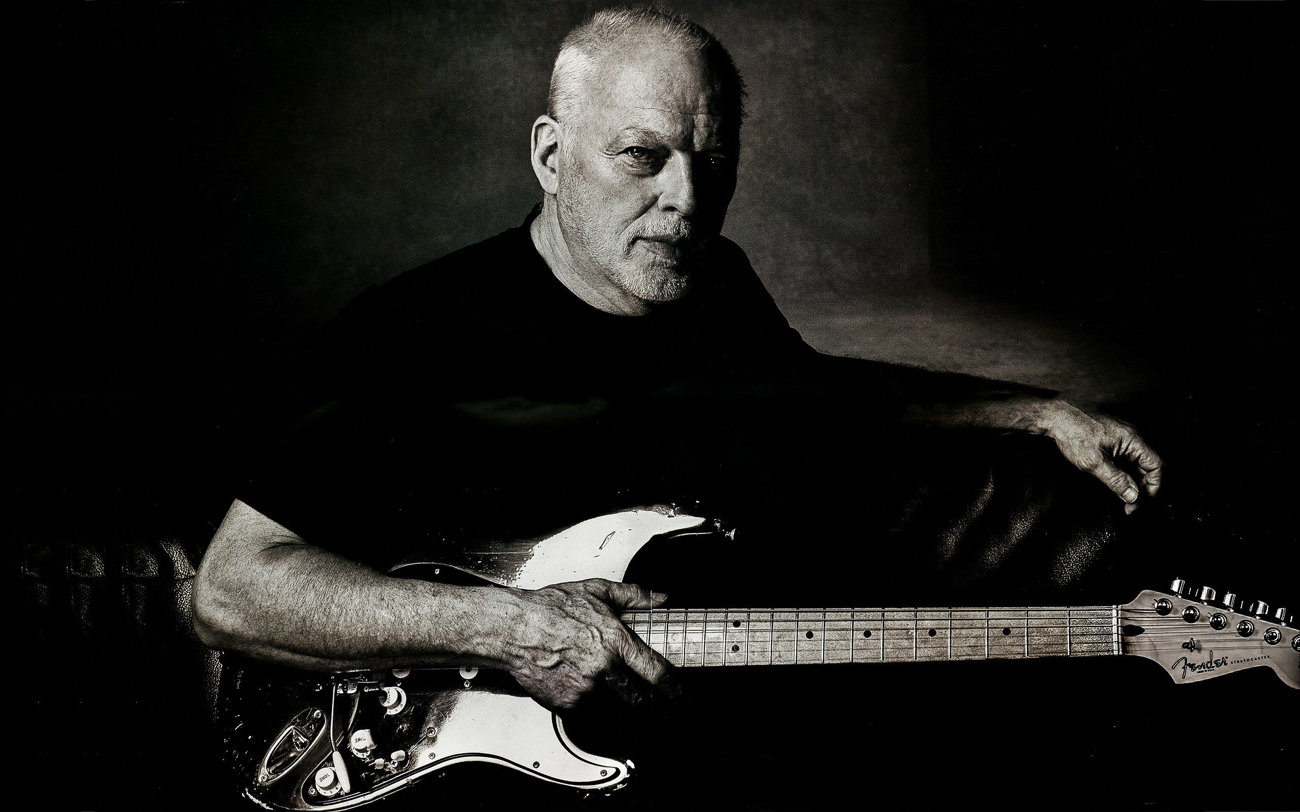 People 2560x1600 Pink Floyd Fender guitar guitarist Stratocaster dark men musician Dave Gilmour