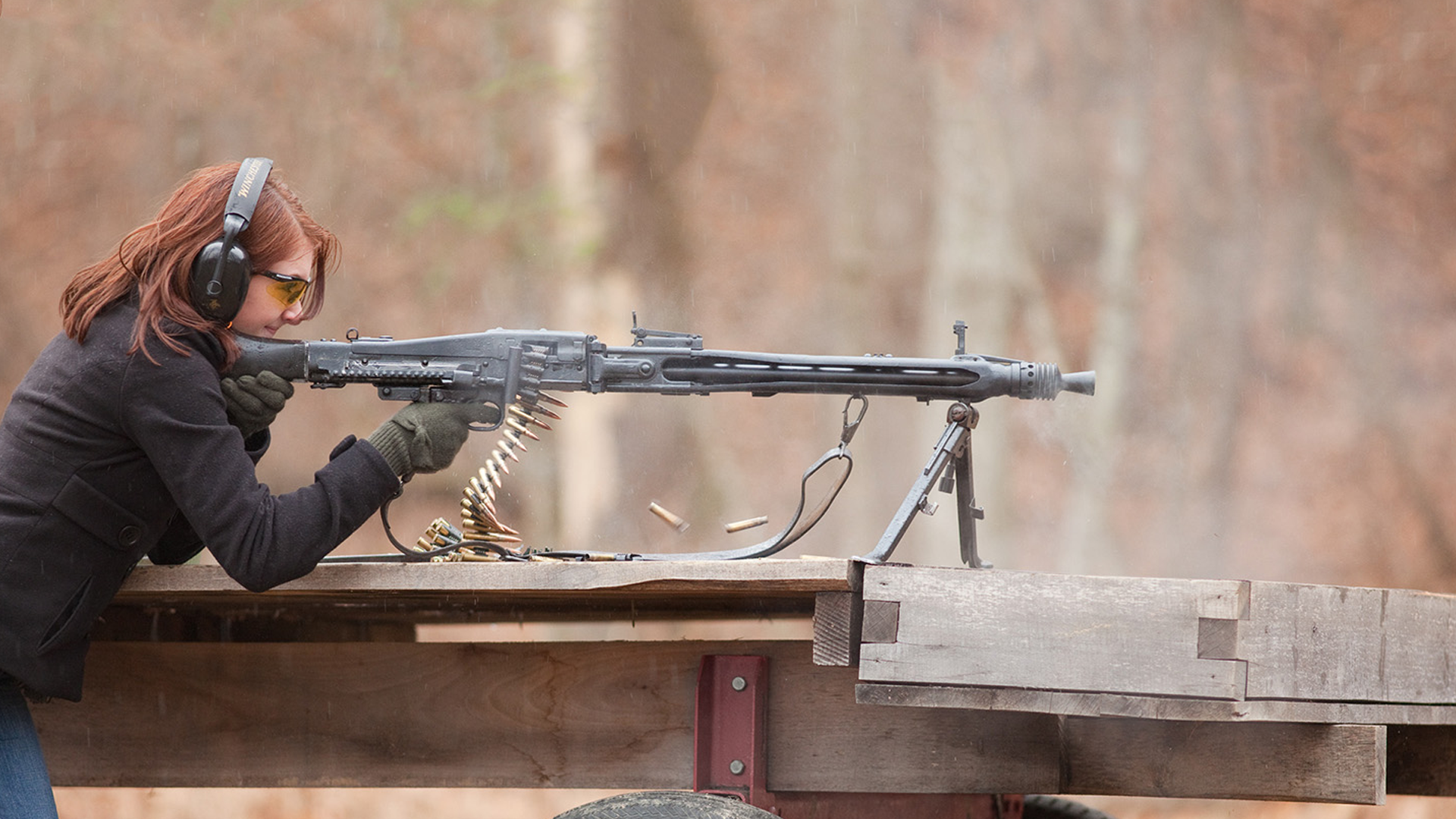 People 1920x1080 women redhead MG42 machine gun 7.62x51 girls with guns aiming headphones ammunition