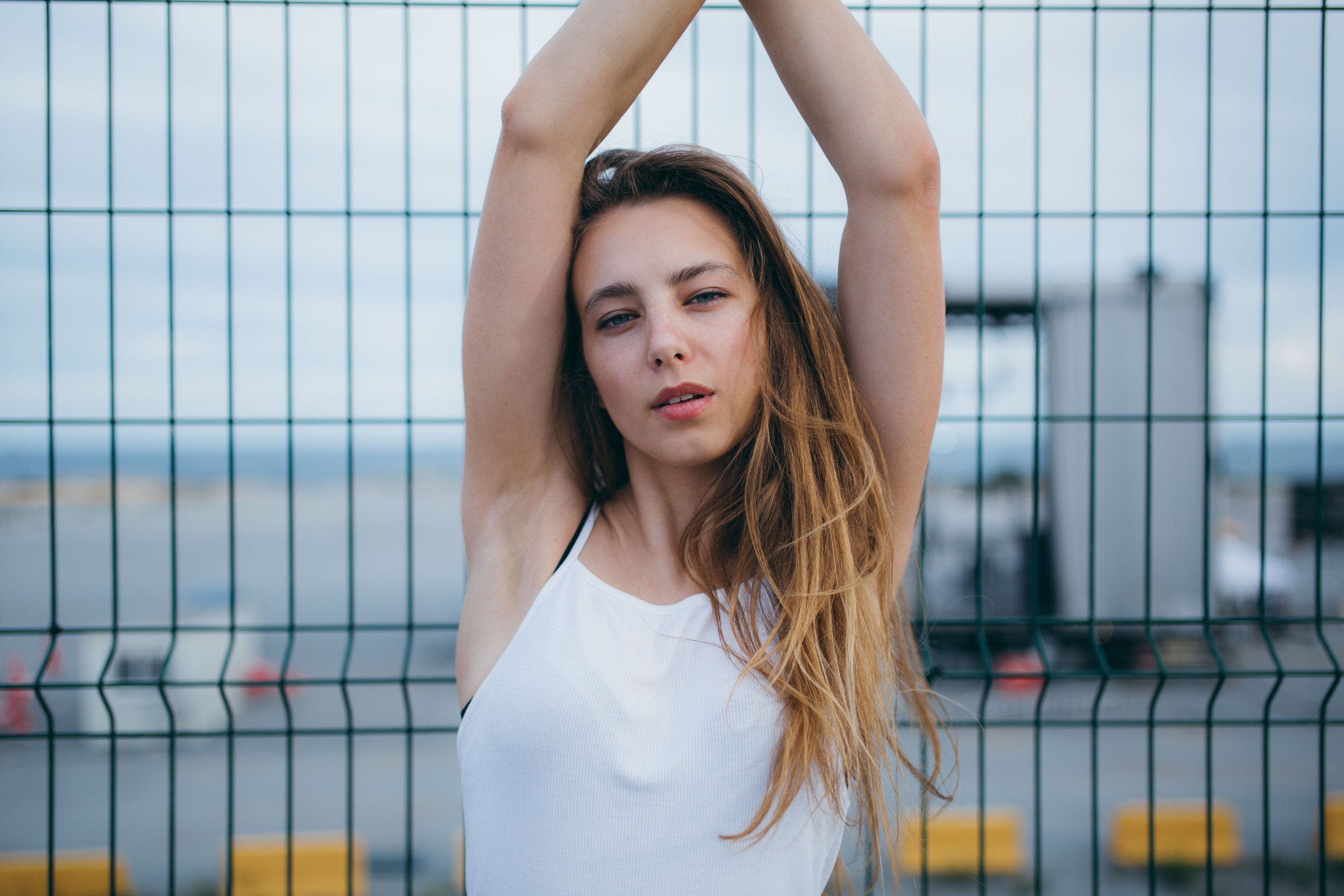 People 2048x1366 women blonde blue eyes open mouth portrait white tops arms up fence looking at viewer Iulia Pironea armpits