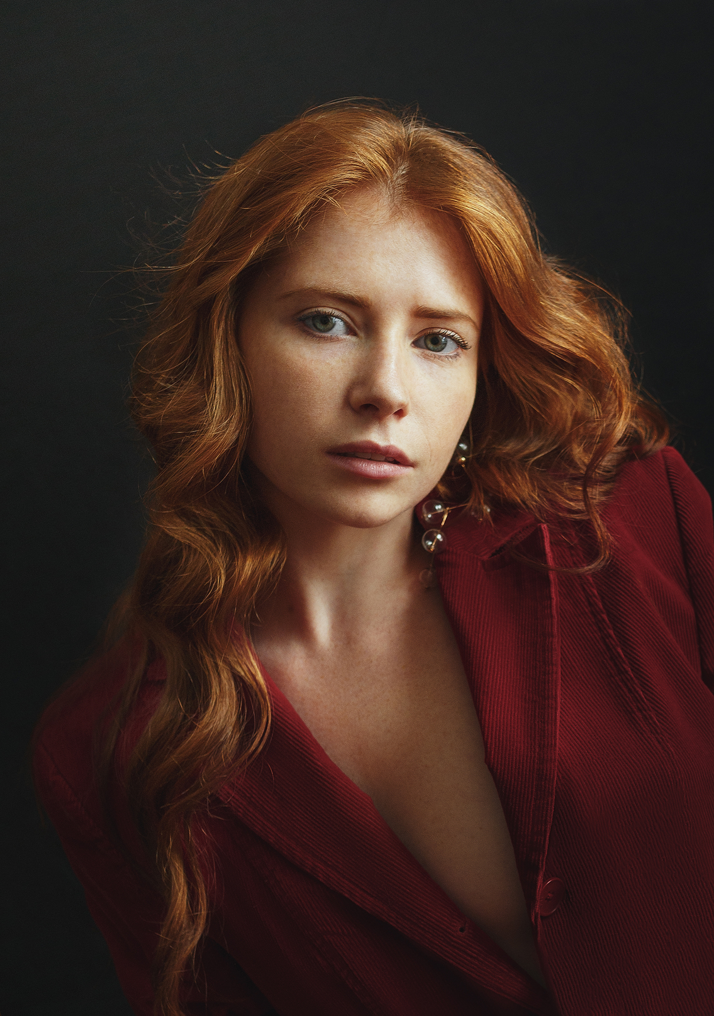 People 1440x2050 Oxana Vedmedenko women redhead long hair wavy hair looking at viewer freckles red clothing open clothes jewelry earring simple background portrait portrait display