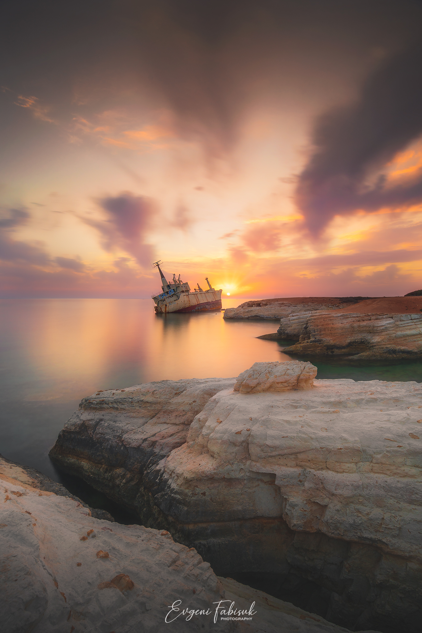 General 1365x2048 nature landscape portrait display shipwreck Evgeni Fabisuk rocks cliff Sun clouds Cyprus sea