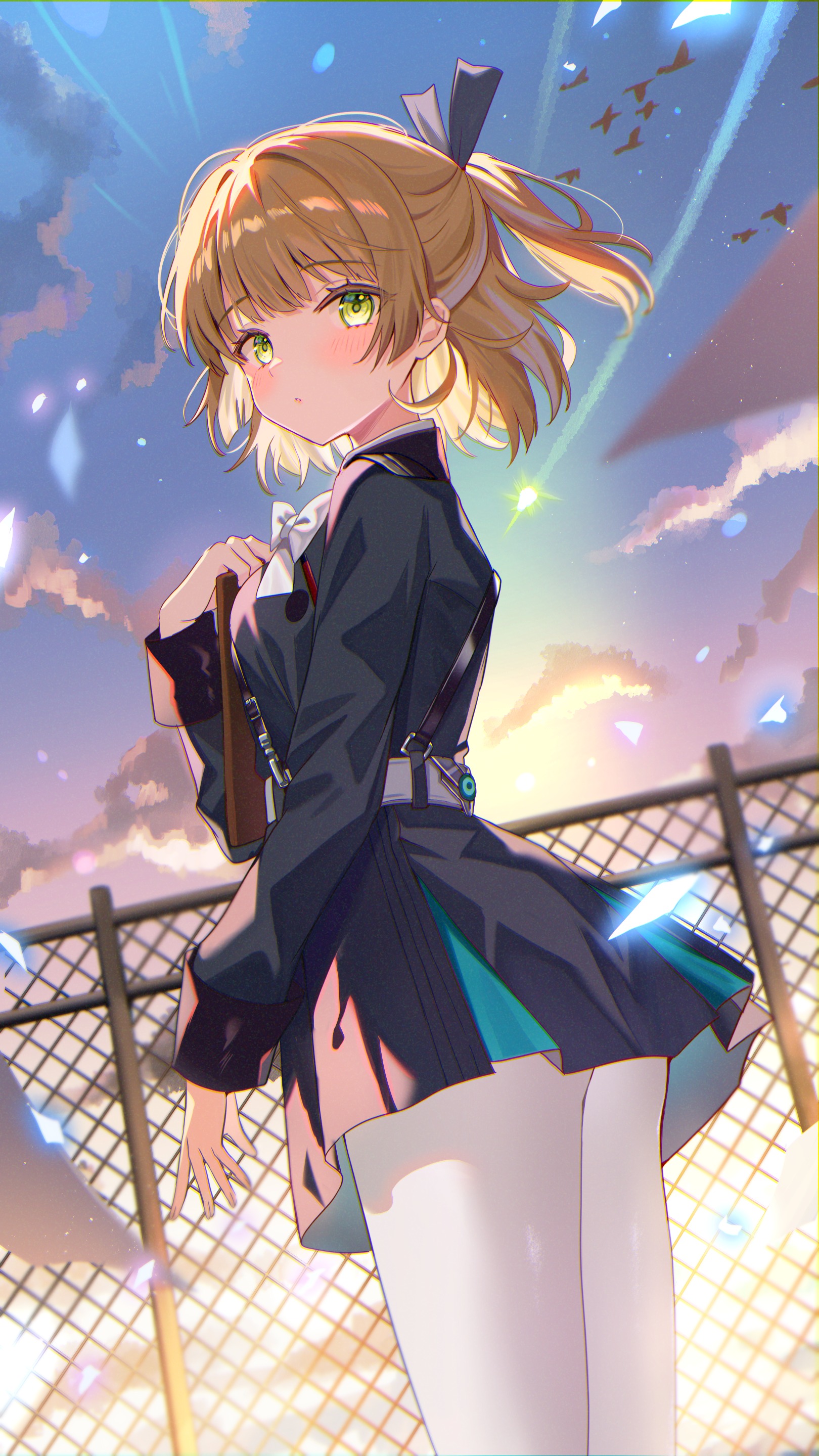 Anime 1620x2880 Heaven Burns Red blonde portrait display anime girls Nanase Nanami (Heaven Burns Red) looking back black dress pantyhose clipboards hair ribbon green eyes long sleeves Satoupote blushing white belt looking at viewer clouds long hair women outdoors sunset white pantyhose sunset glow parted lips ponytail white bow sky dress grid fence wind petals