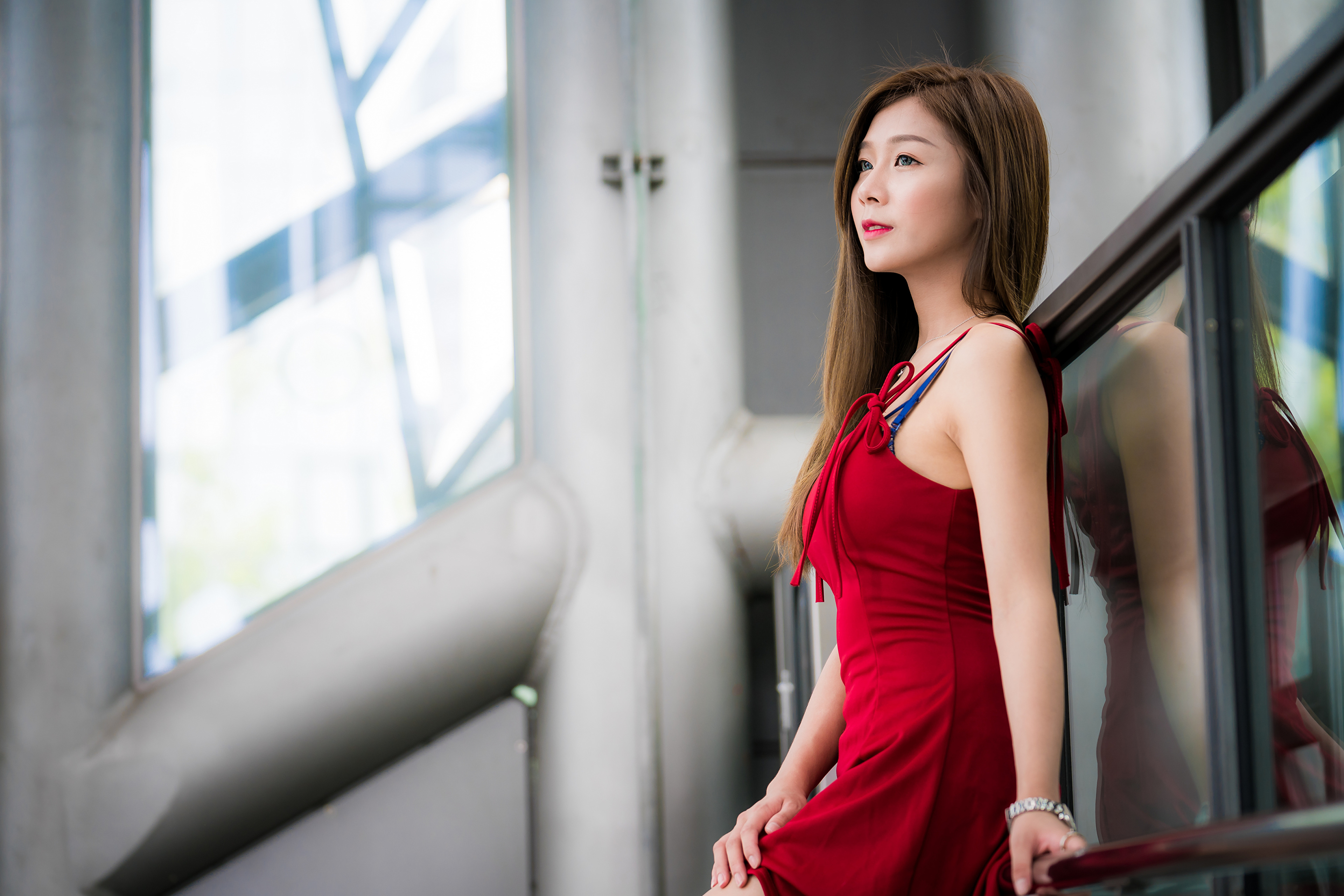 People 3840x2561 Asian model women long hair brunette red dress bra straps leaning wristwatch necklace window depth of field railing