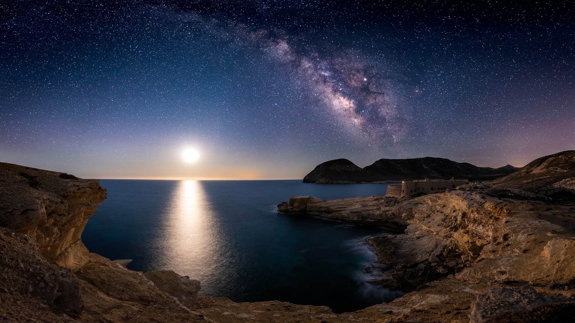 General 1920x1080 sea castle sky Milky Way mountains sunset