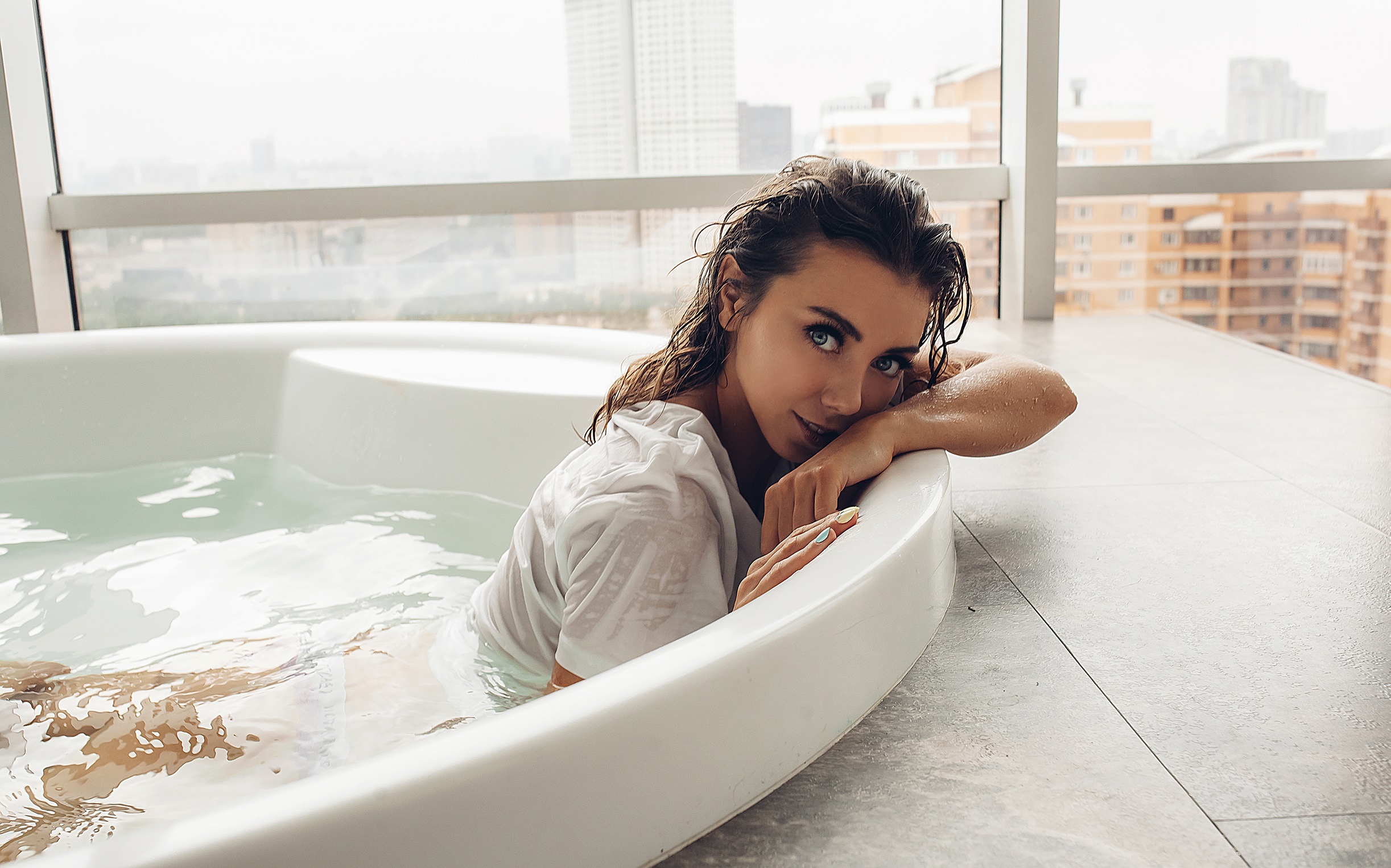 People 2445x1526 women window bathtub brunette water wet body face wet hair T-shirt Victoria's Secret Alena Filatova
