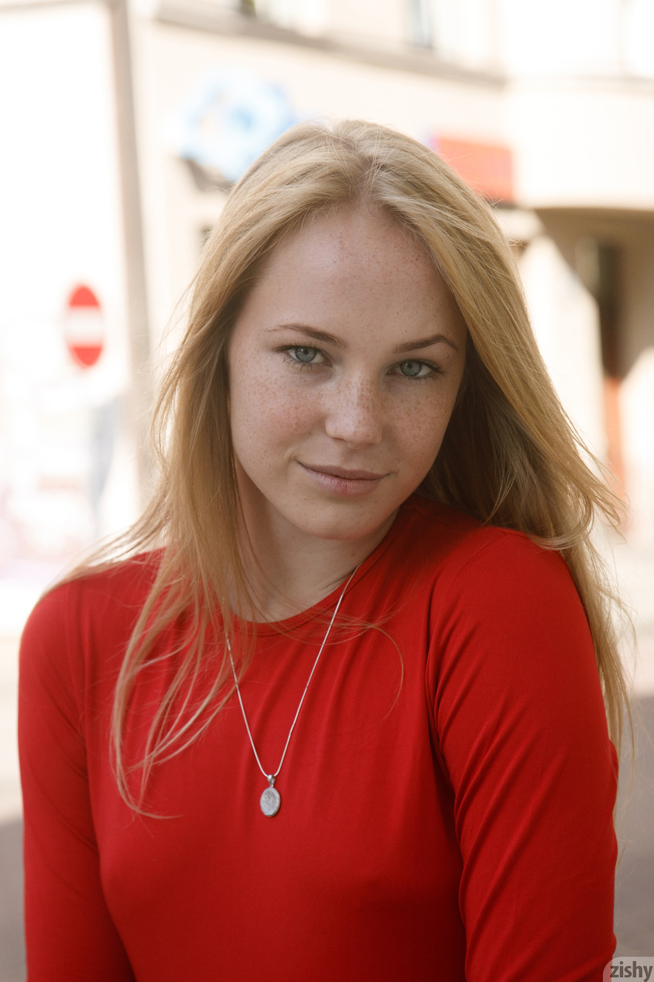 People 1280x1920 Rune Kimele Zishy blonde women outdoors freckles looking at viewer depth of field necklace women model face portrait display blue eyes red shirt watermarked