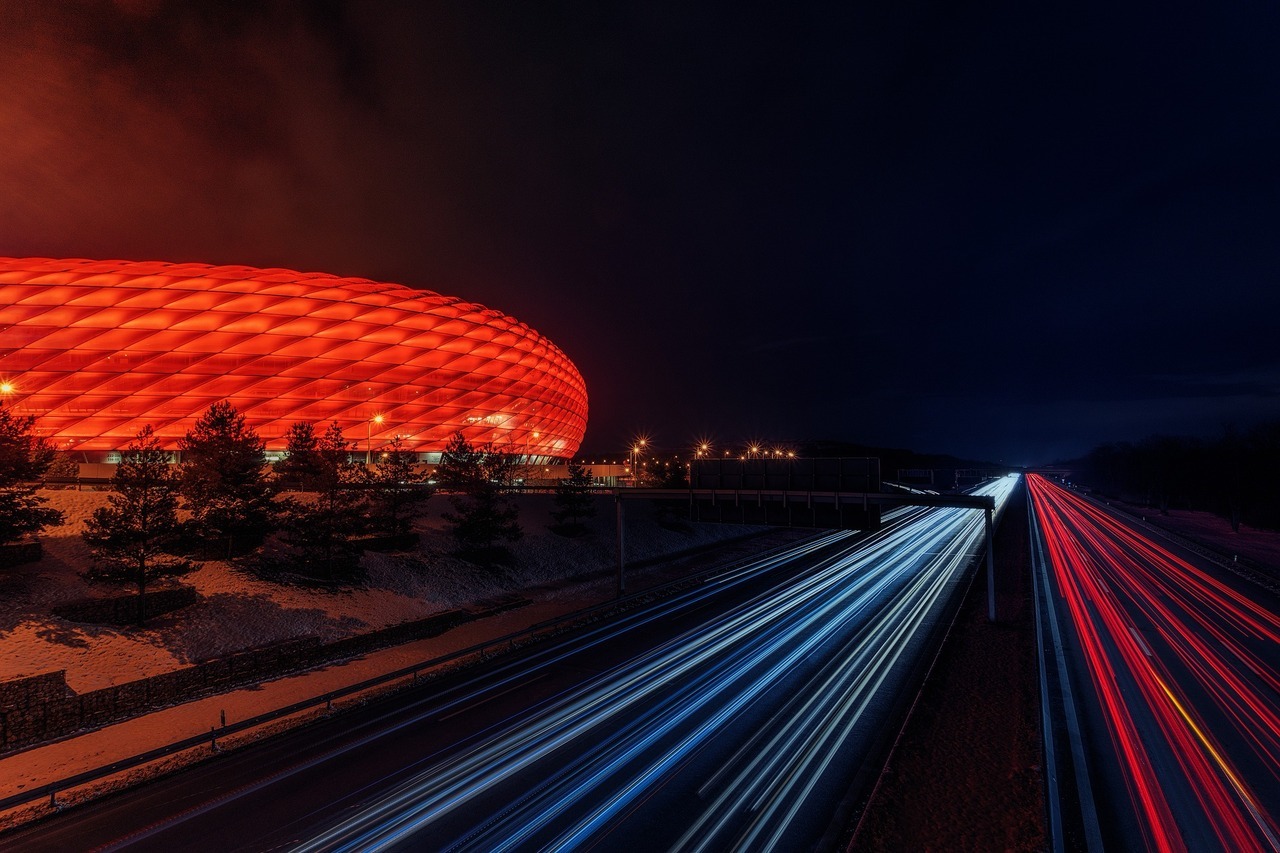 General 1280x853 photography night long exposure road Munich Germany stadium football stadium Allianz Arena  trees light trails lights