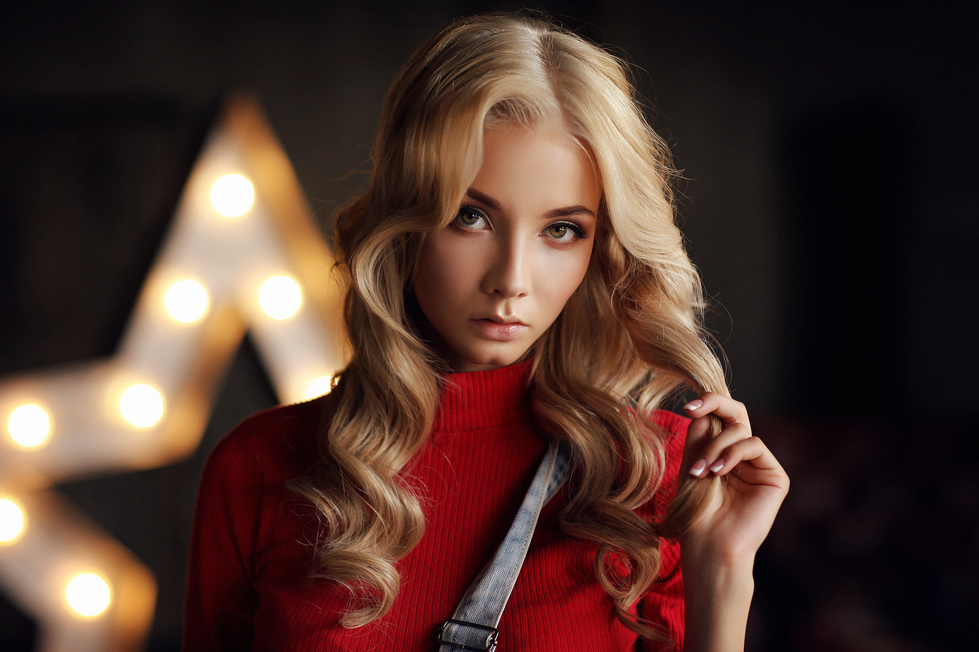 People 1920x1280 women blonde portrait overalls Dmitry Arhar Katerina Shiryaeva red sweater looking at viewer makeup touching hair hazel eyes sweater star marquee light closeup