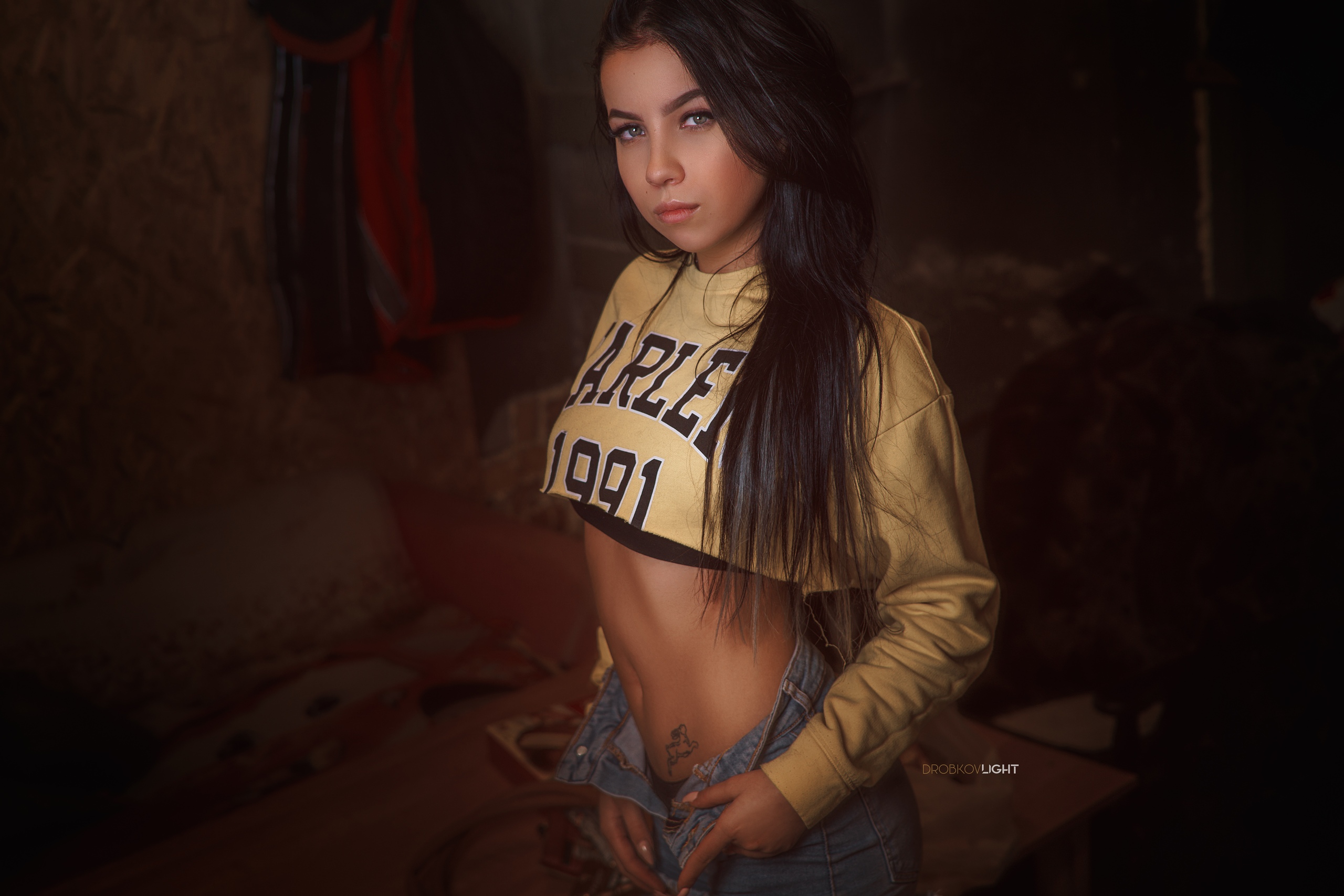 People 2560x1707 Angelina Sorokina women model dark hair long hair looking at viewer portrait crop top belly tattoo jean shorts painted nails bokeh standing indoors women indoors Alexander Drobkov brunette