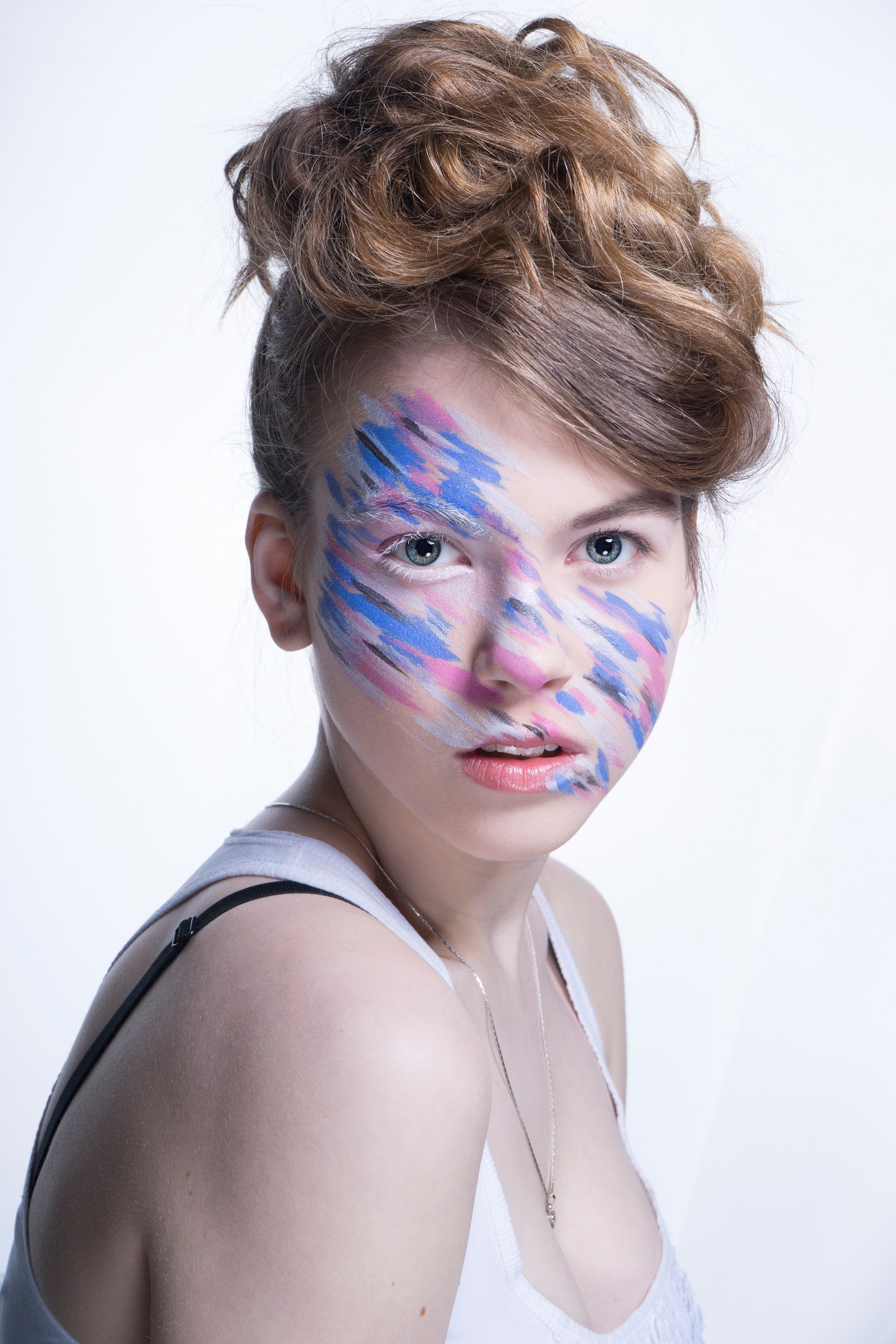 People 1440x2160 Alexey Sominsky women brunette hairbun looking at viewer makeup face paint open mouth blue eyes colorful blue pink tank top necklace portrait simple background white background jewelry