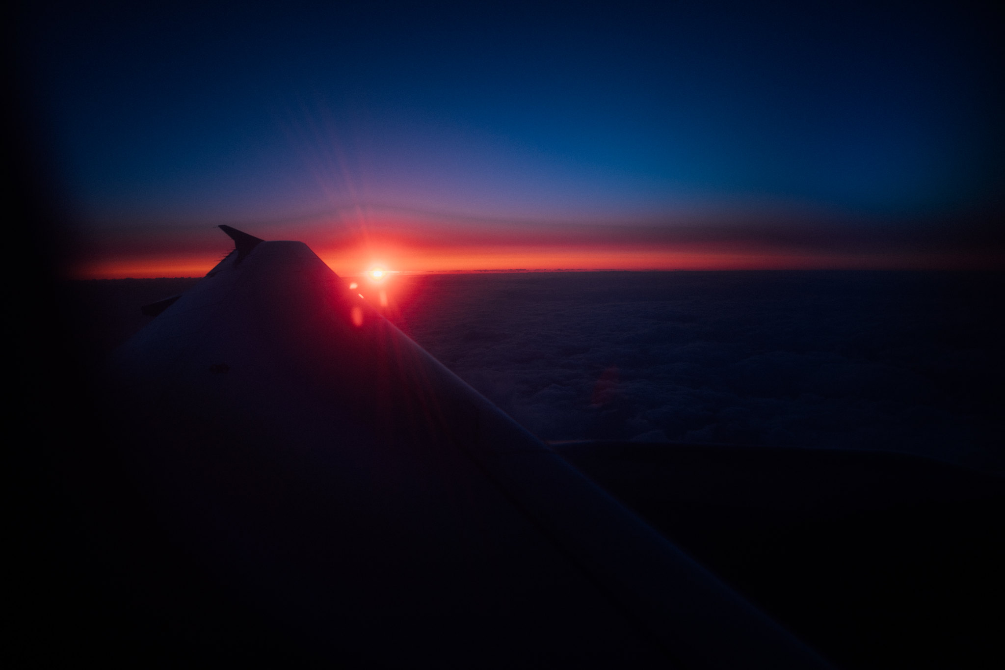 General 2048x1365 clouds sunset horizon airplane wing airplane aircraft Sun dark vehicle low light