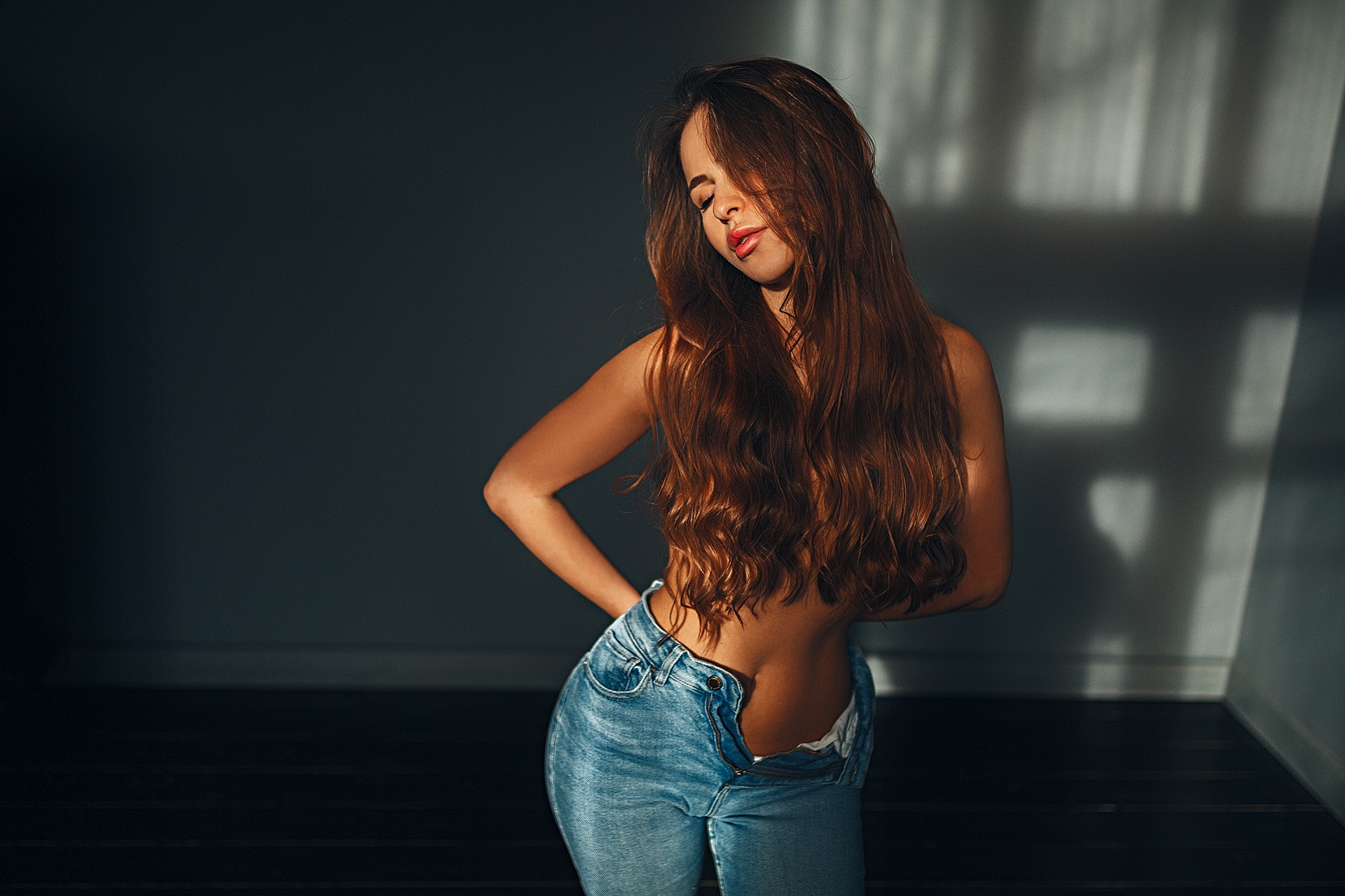 People 1920x1280 women model brunette long hair closed eyes juicy lips topless hair covering boobs belly jeans indoors women indoors Grigoriy Lifin hairbra arm(s) behind back undressing sensual gaze blue pants strategic covering open jeans unzipped tight pants blue  jeans