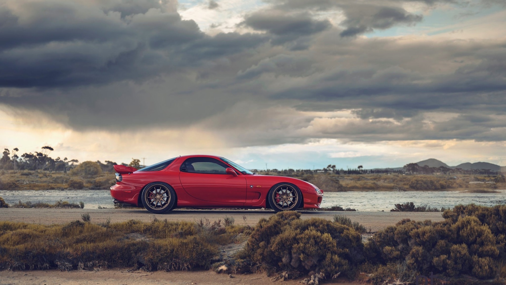General 1920x1080 Mazda RX-7 Mazda Japanese cars red cars clouds sky car vehicle sports car water side view outdoors PT works