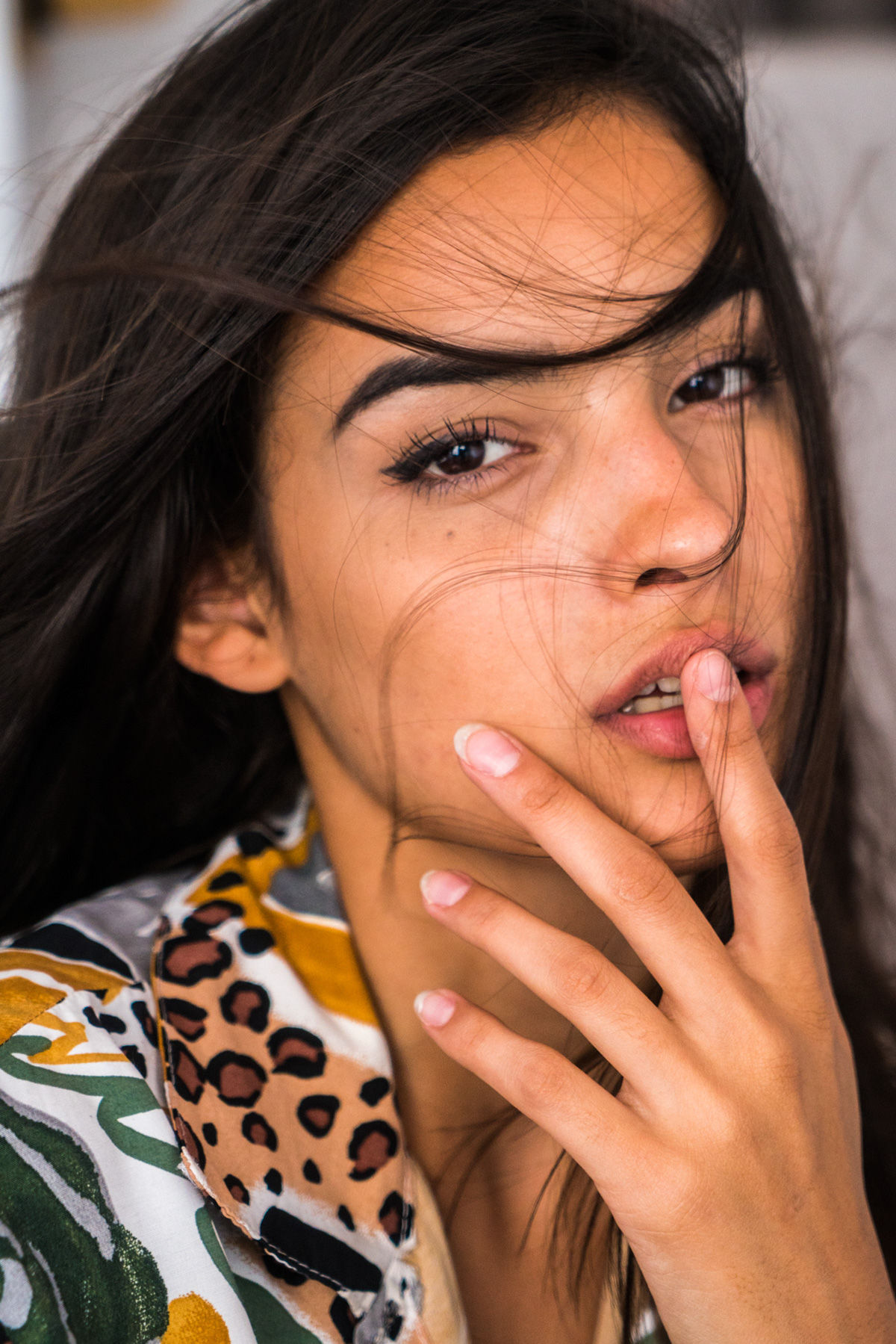 People 1200x1799 women women indoors face brunette model portrait display closeup finger on lips windy hair in face