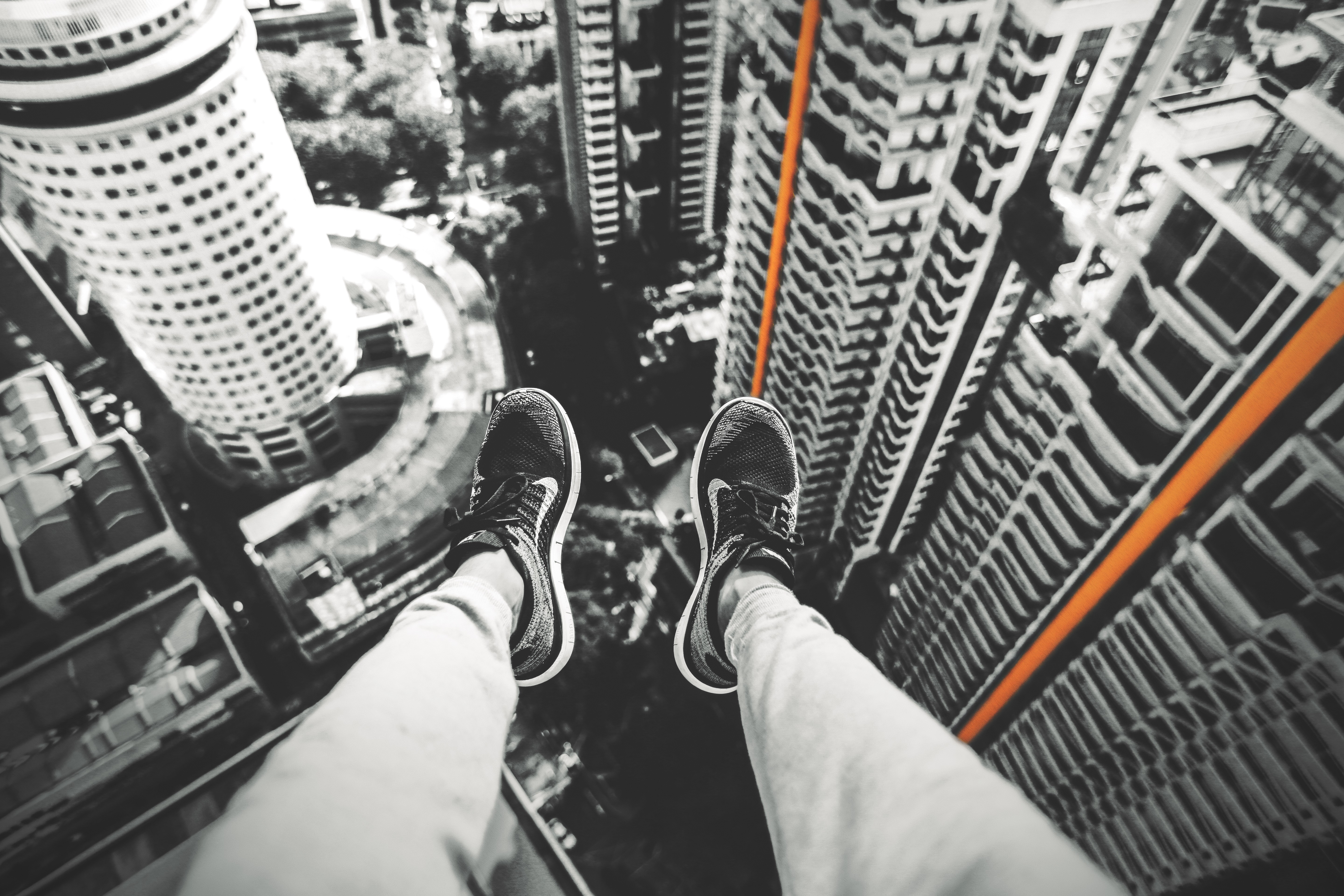 People 5760x3840 skyscraper legs Nike selective coloring cityscape rooftops gray city sneakers POV