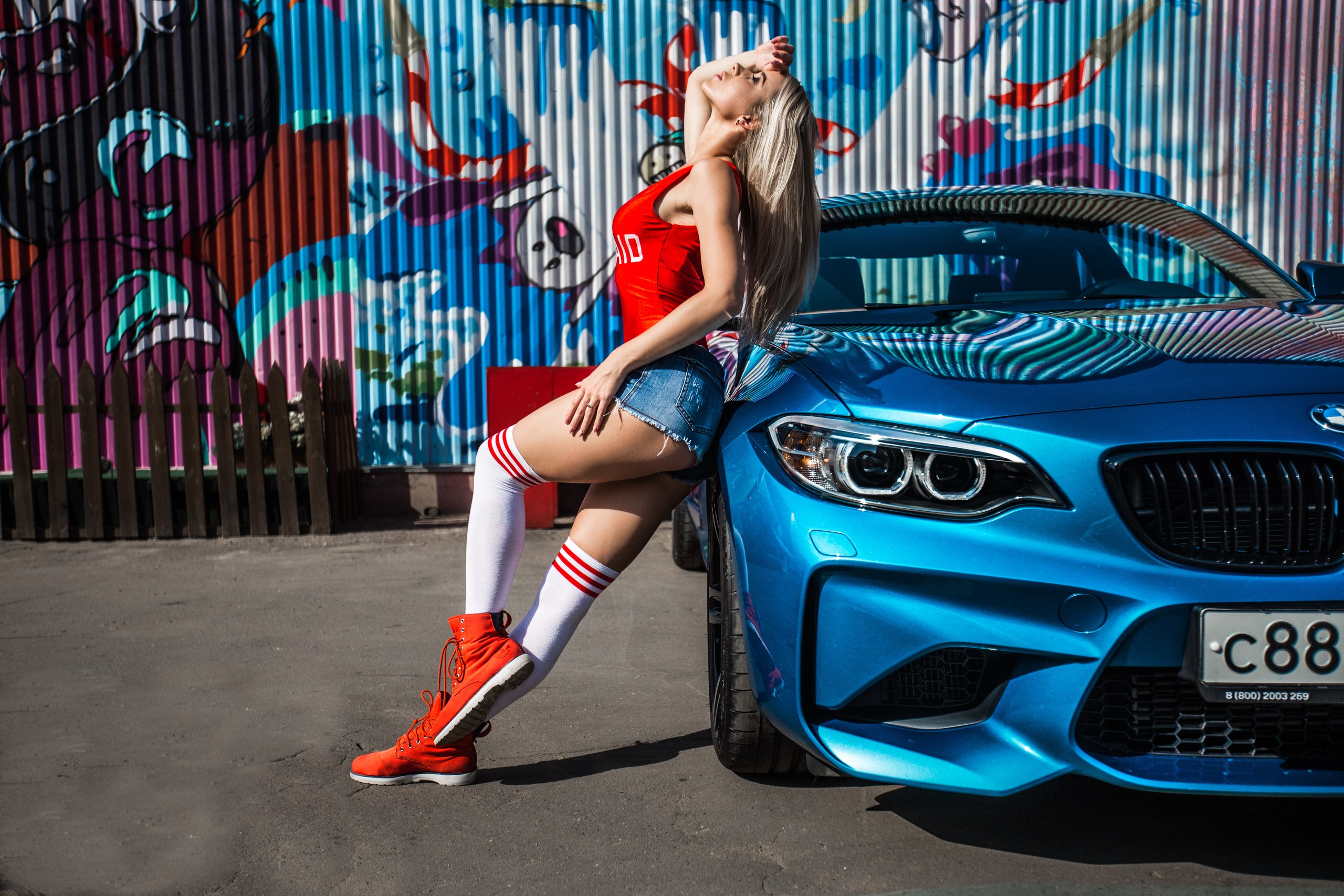 People 2560x1707 women blonde jean shorts women with cars T-shirt ass white stockings women outdoors BMW graffiti tanned shoes knee-highs thigh-highs socks BMW 2 Series car
