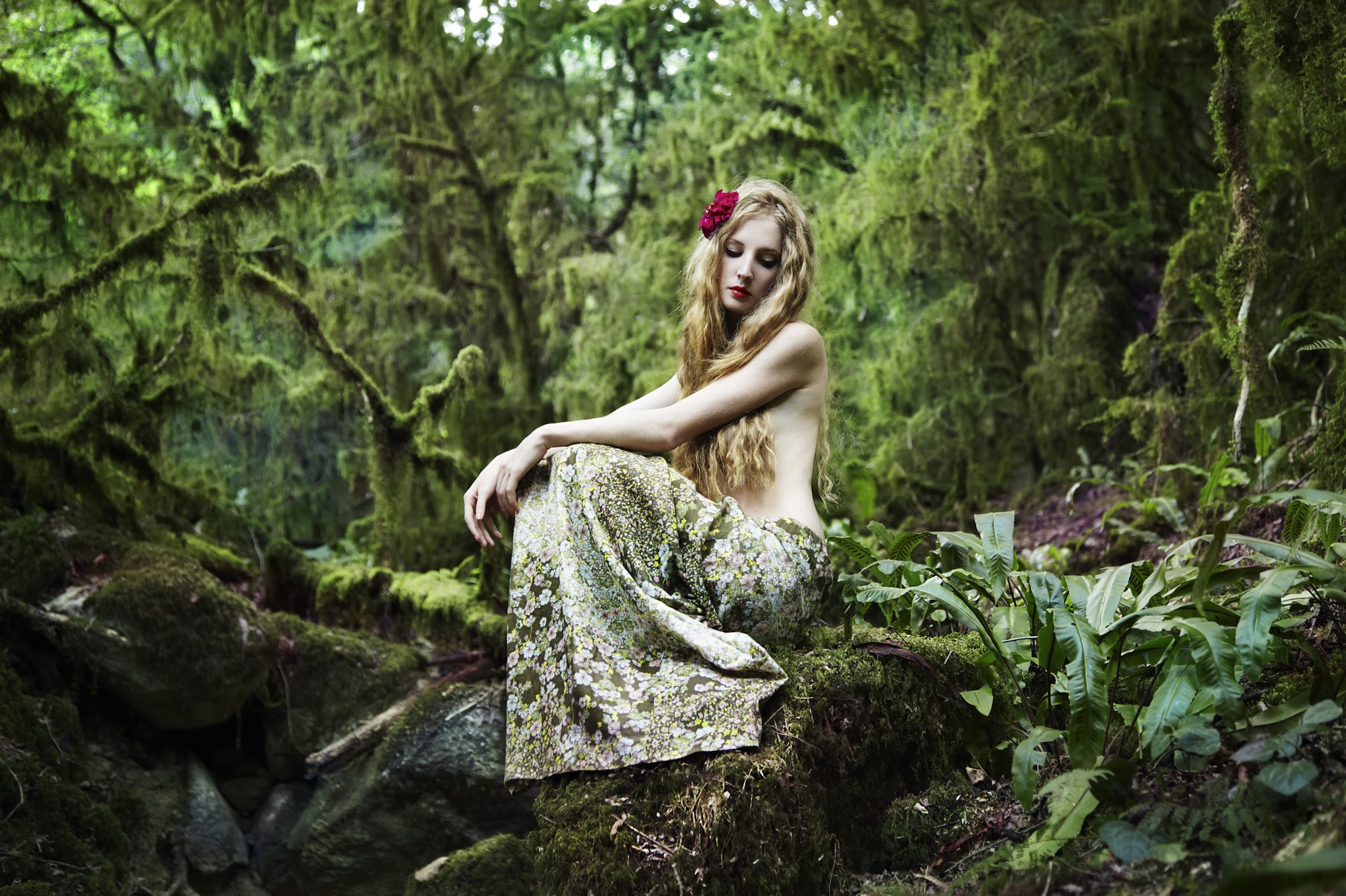 People 2048x1365 blonde women model looking away moss rocks trees plants outdoors women outdoors sitting makeup red lipstick flower in hair strategic covering hair over nipples