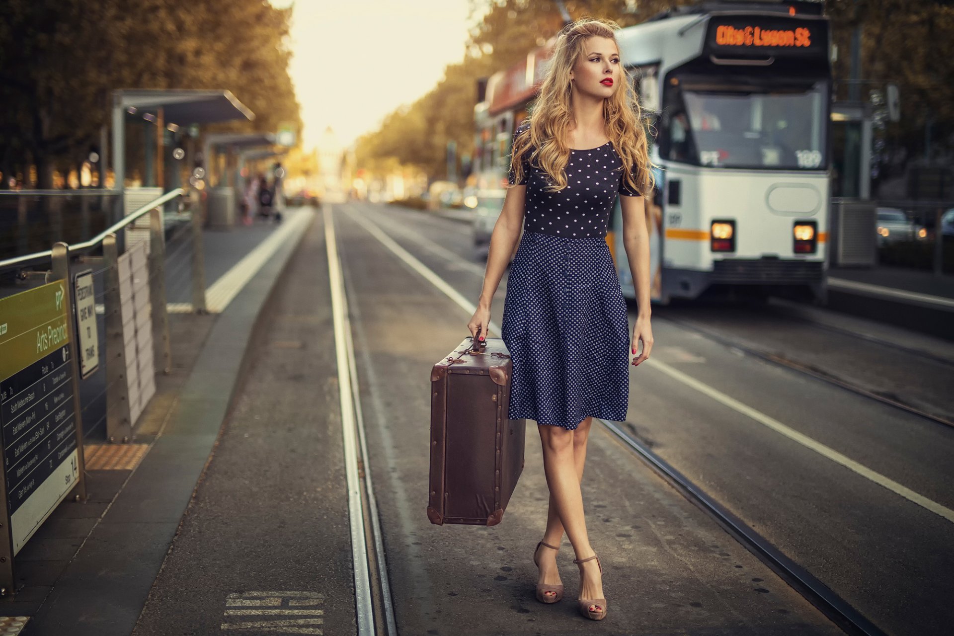 People 1920x1280 women model blonde long hair women outdoors street blue dress polka dots high heels red lipstick luggage suitcase tram legs crossed