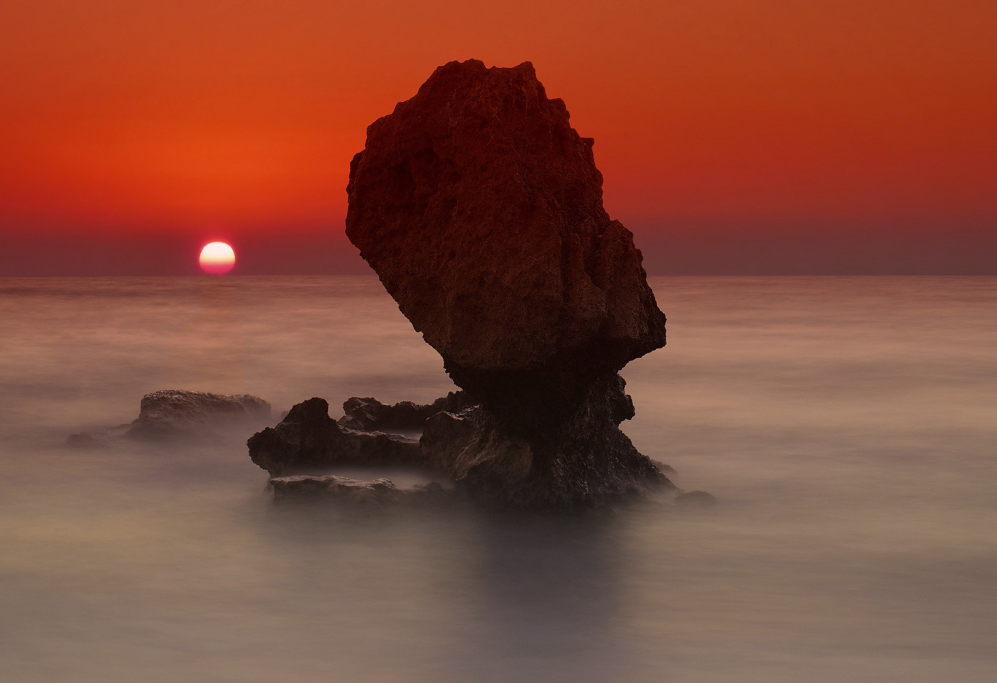General 2048x1404 Sun sea sunset orange sky rocks rock formation skyscape nature red sky low light