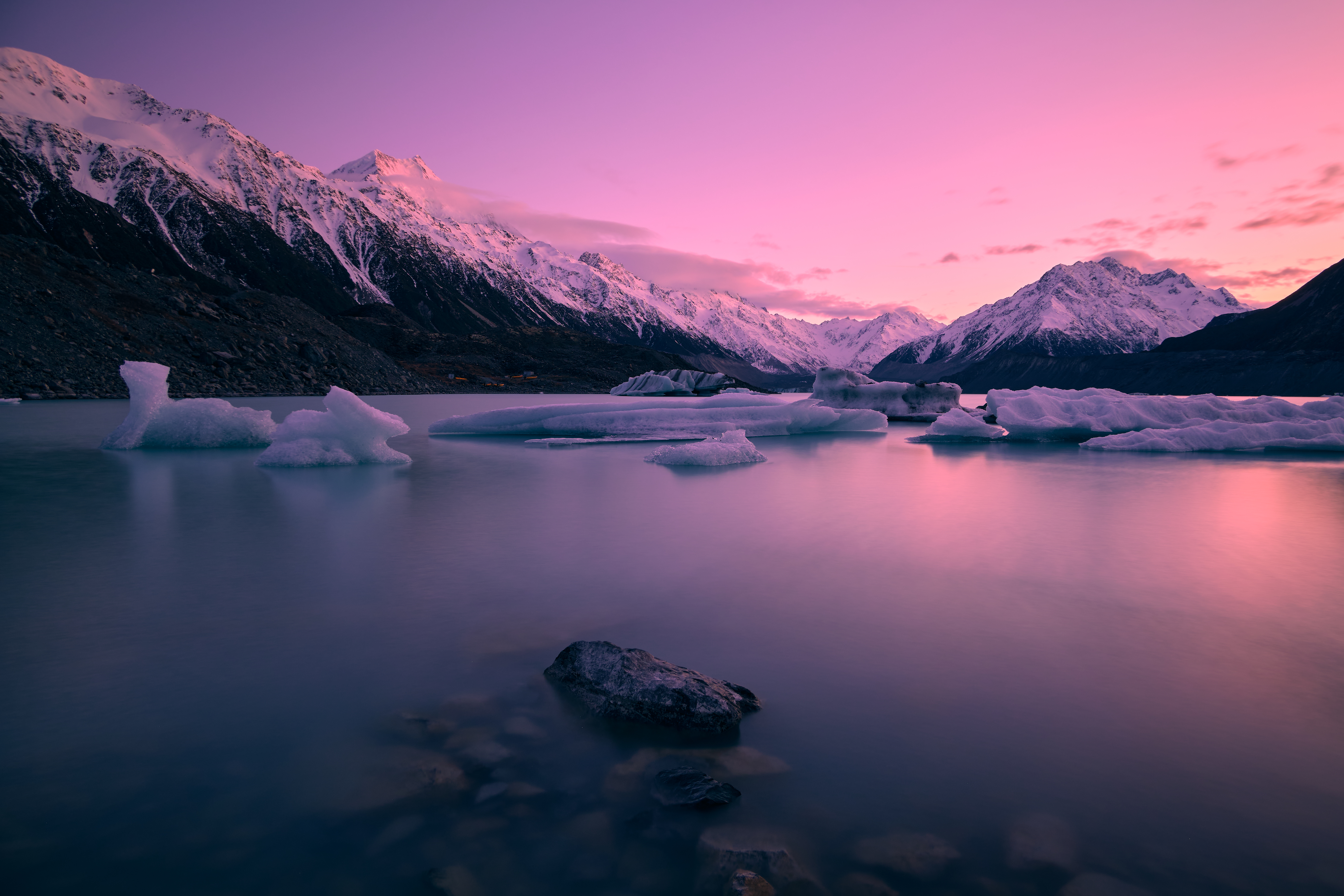 General 6229x4153 nature landscape mountains snowy peak snow ice rocks water sky clouds long exposure dawn Tasman Lake New Zealand Caroline Huber