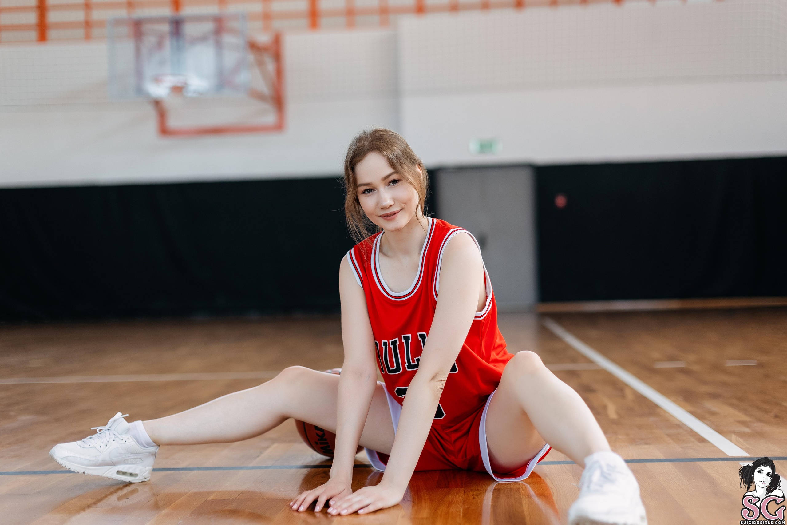 People 2560x1707 Lisaberry Suicide Girls women brunette model looking at viewer basketball spread legs shoes on the floor uniform bokeh pale Chicago Bulls watermarked sitting
