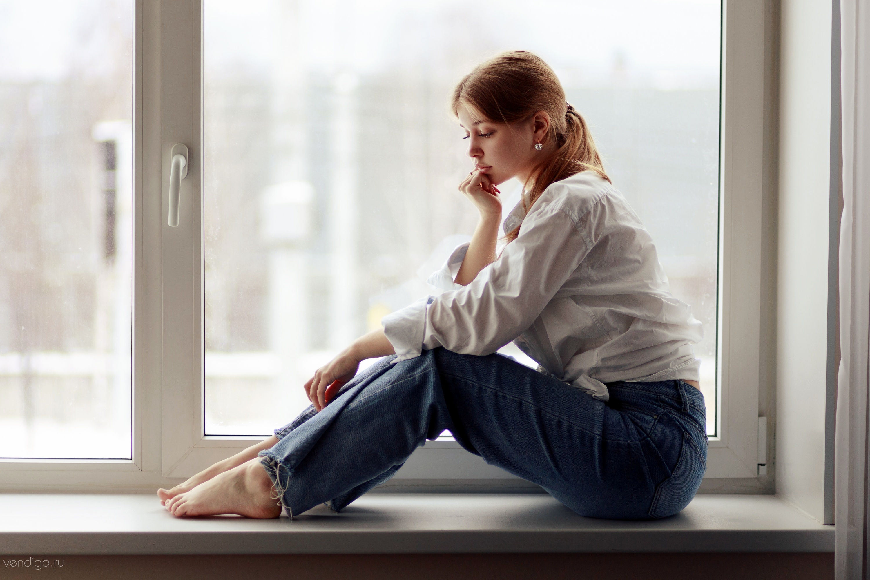 People 3000x2000 model red lipstick white shirt jeans barefoot sitting by the window hand on face women