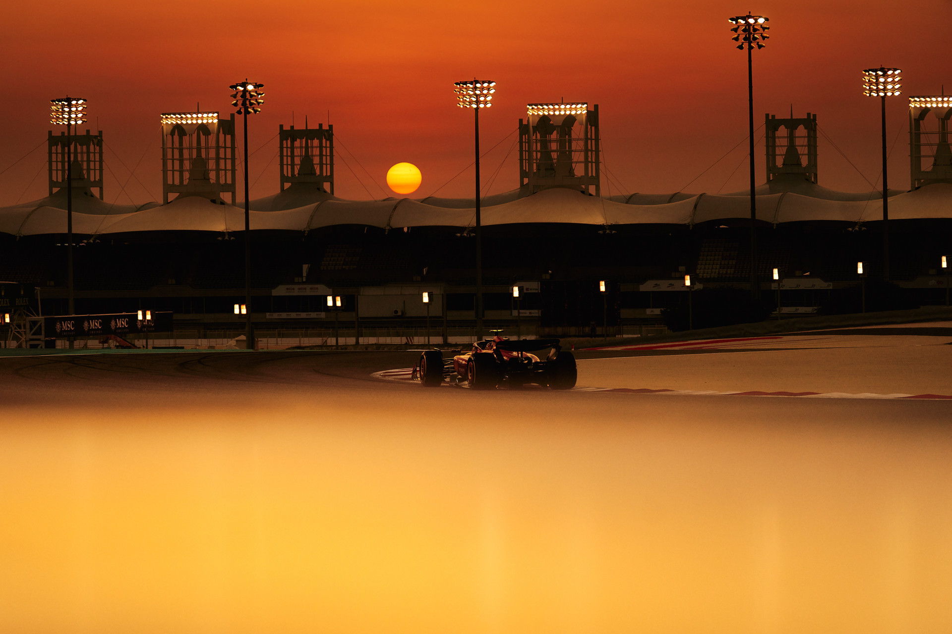 General 1920x1280 Ferrari Formula 1 Scuderia Ferrari vehicle lights car sky sunset sunset glow race cars race tracks Sun
