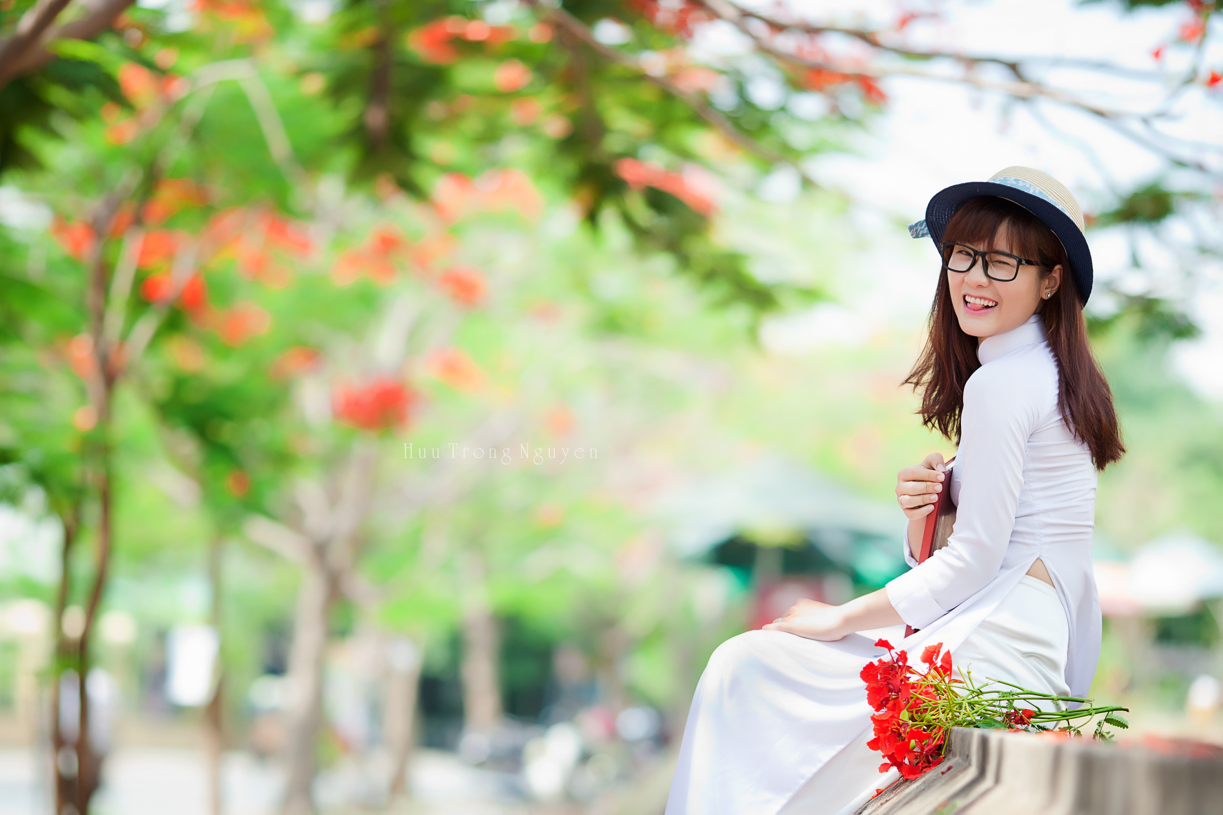 People 4134x2756 fake glasses Vietnam sitting wink hat millinery redhead auburn hair tongues áo dài Vietnamese Vietnam dress women Vietnamese women tongue out women with hats women outdoors long hair white clothing white dress